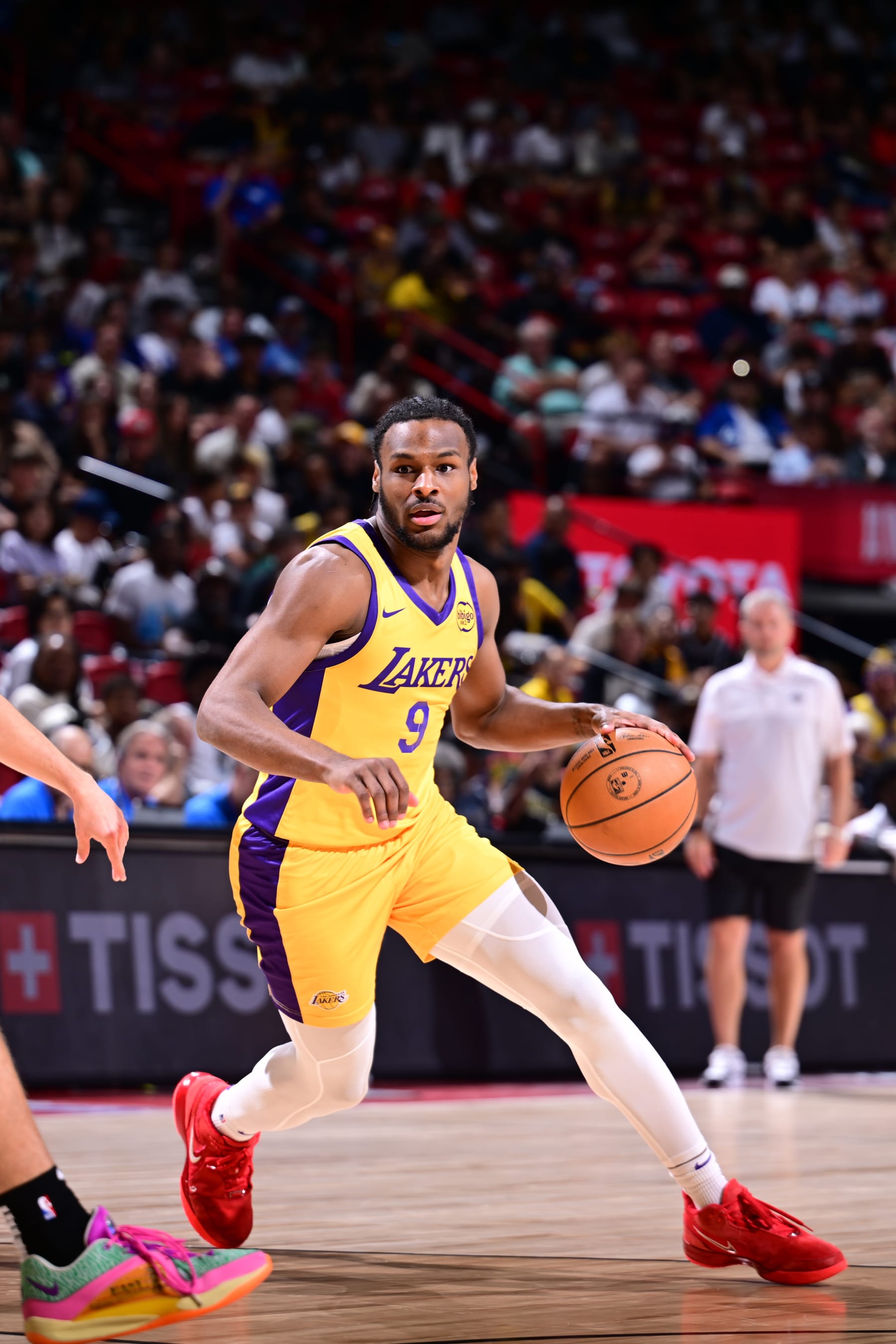LAS VEGAS, NV - JULY 18:  Bronny James Jr. #9 of the Los Angeles Lakers goes to the basket during the game on July 18, 2024 at the Thomas & Mack Center in Las Vegas, Nevada. NOTE TO USER: User expressly acknowledges and agrees that, by downloading and or using this photograph, User is consenting to the terms and conditions of the Getty Images License Agreement. Mandatory Copyright Notice: Copyright 2024 NBAE (Photo by Adam Hagy/NBAE via Getty Images)