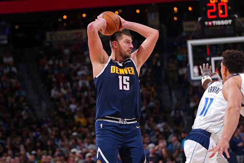 DENVER, CO - NOVEMBER 10: Nikola Jokic #15 of the Denver Nuggets looks to pass the ball during the game against the Dallas Mavericks during a regular season game on November 10, 2024 at Ball Arena in Denver, Colorado. NOTE TO USER: User expressly acknowledges and agrees that, by downloading and/or using this Photograph, user is consenting to the terms and conditions of the Getty Images License Agreement. Mandatory Copyright Notice: Copyright 2024 NBAE (Photo by Bart Young/NBAE via Getty Images)