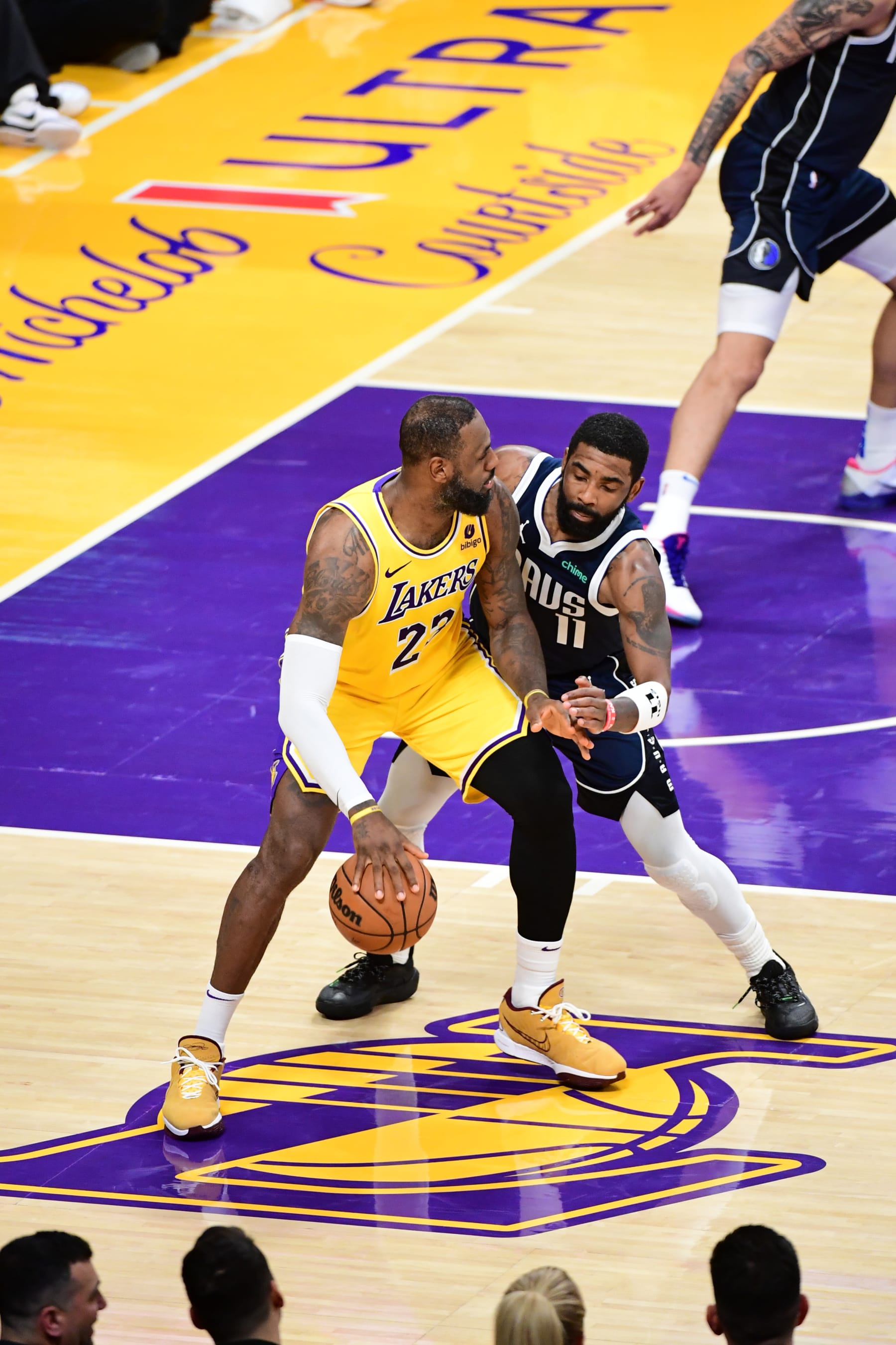 LOS ANGELES, CA - JANUARY 17: Kyrie Irving #11 of the Dallas Mavericks plays defense against LeBron James #23 of the Los Angeles Lakers during the game on January 17, 2024 at Crypto.Com Arena in Los Angeles, California. NOTE TO USER: User expressly acknowledges and agrees that, by downloading and/or using this Photograph, user is consenting to the terms and conditions of the Getty Images License Agreement. Mandatory Copyright Notice: Copyright 2024 NBAE (Photo by Adam Pantozzi/NBAE via Getty Images)