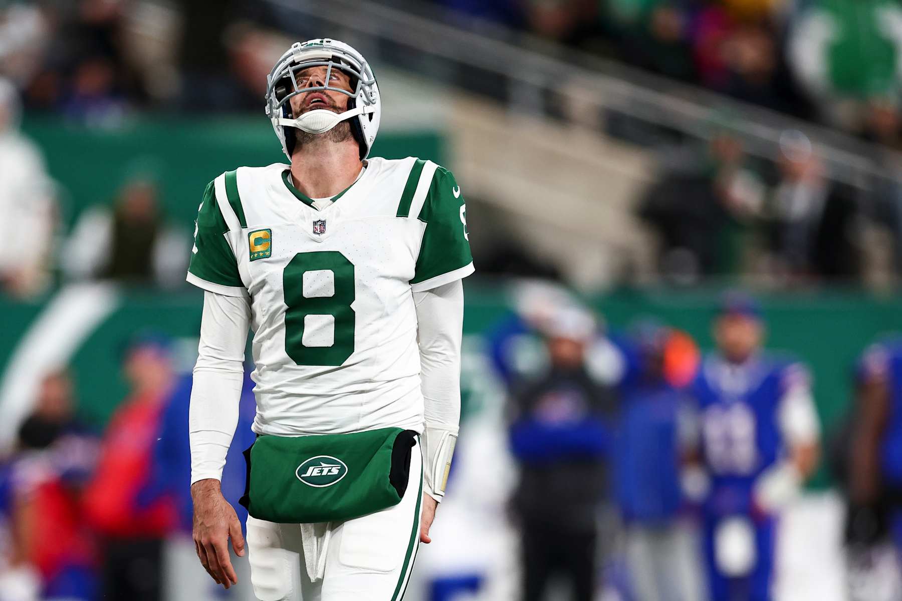 EAST RUTHERFORD, NEW JERSEY - OCTOBER 14: Aaron Rodgers #8 of the New York Jets reacts after a play during the second half of an NFL game against the Buffalo Bills at MetLife Stadium on October 14, 2024 in East Rutherford, New Jersey. (Photo by Kevin Sabitus/Getty Images)