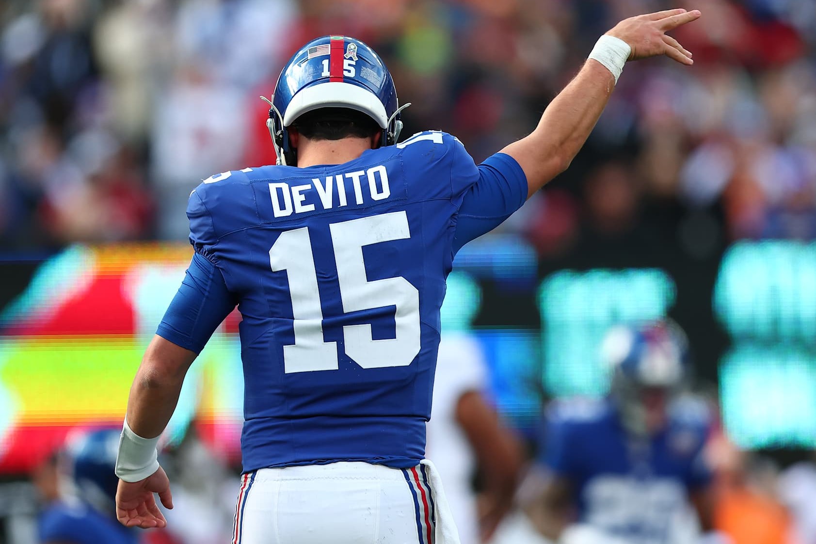 EAST RUTHERFORD, NEW JERSEY - NOVEMBER 24: Tommy DeVito #15 of the New York Giants reacts during the first half against the Tampa Bay Buccaneers at MetLife Stadium on November 24, 2024 in East Rutherford, New Jersey. (Photo by Dustin Satloff/Getty Images)
