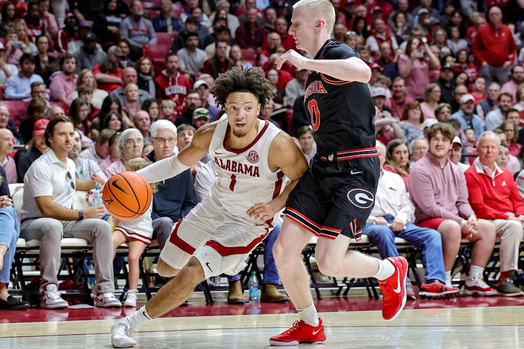 TUSCALOOSA, ALABAMA - FEBRUARY 1: Mark Sears #1 of the Alabama Crimson Tide drives to the basket during the second half against Dakota Leffew #1 of the Georgia Bulldogs at Coleman Coliseum on February 1, 2025 in Tuscaloosa, Alabama. (Photo by Brandon Sumrall/Getty Images)