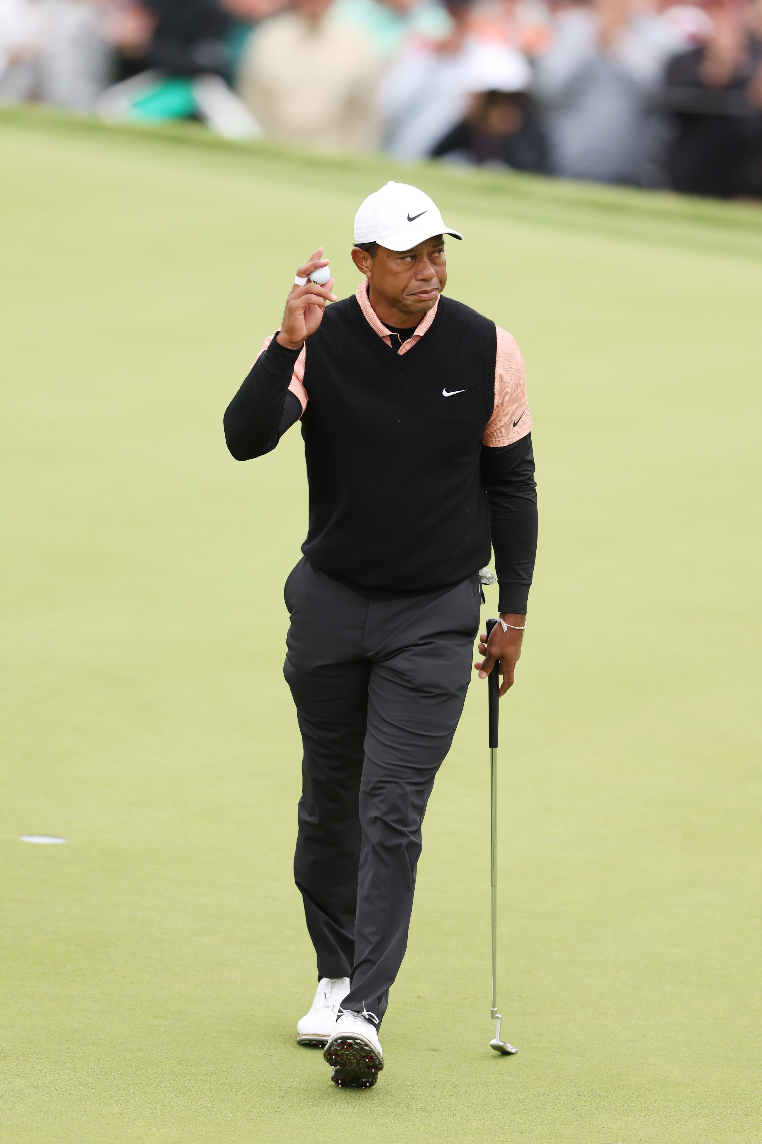 TULSA, OKLAHOMA - MAY 21: Tiger Woods of the United States reacts to his putt on the 18th green during the third round of the 2022 PGA Championship at Southern Hills Country Club on May 21, 2022 in Tulsa, Oklahoma. (Photo by Christian Petersen/Getty Images)