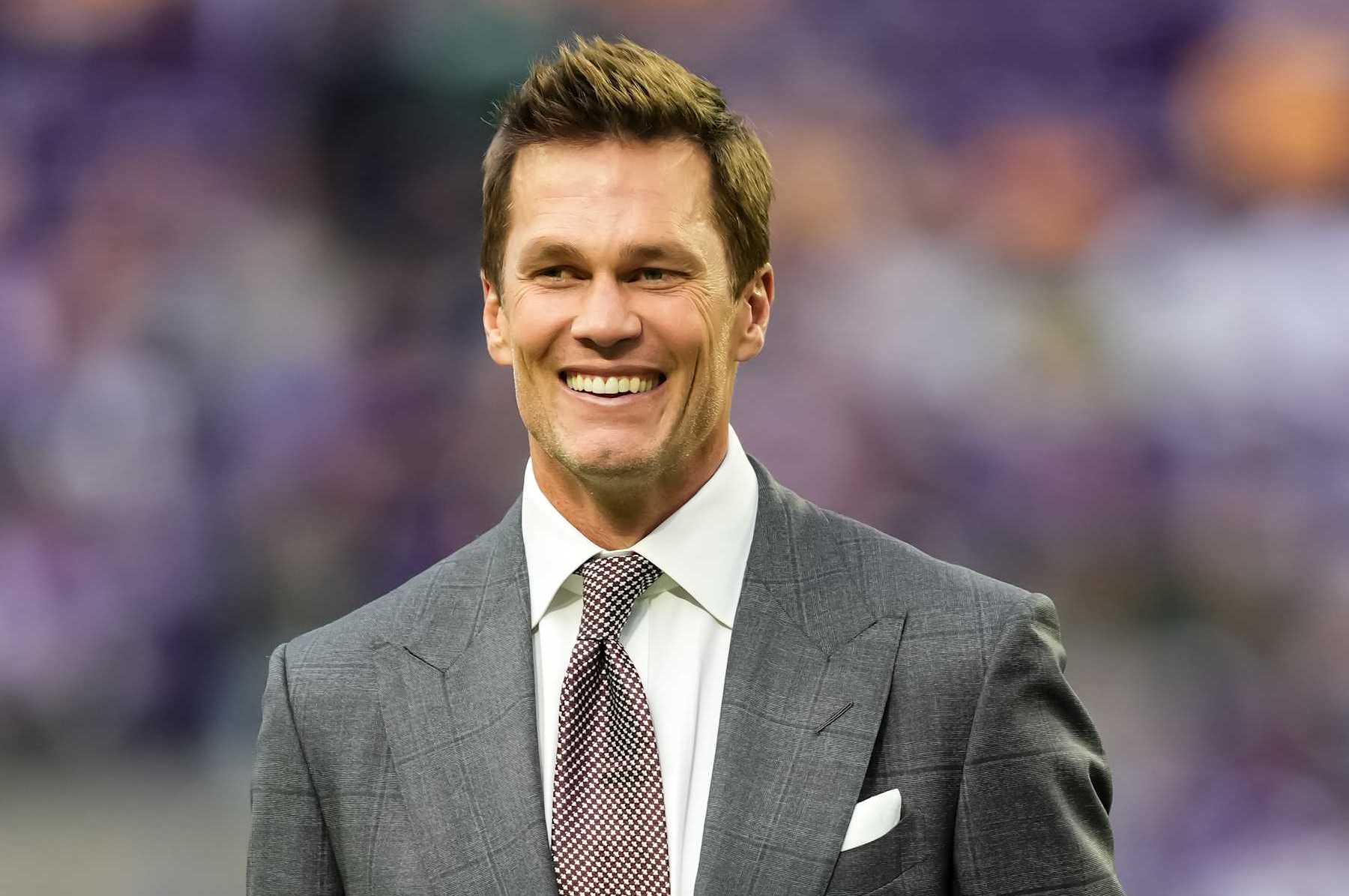 MINNEAPOLIS, MINNESOTA - DECEMBER 29: Former NFL player Tom Brady looks on prior to a game between the Minnesota Vikings and Green Bay Packers at U.S. Bank Stadium on December 29, 2024 in Minneapolis, Minnesota. (Photo by Brace Hemmelgarn/Getty Images)