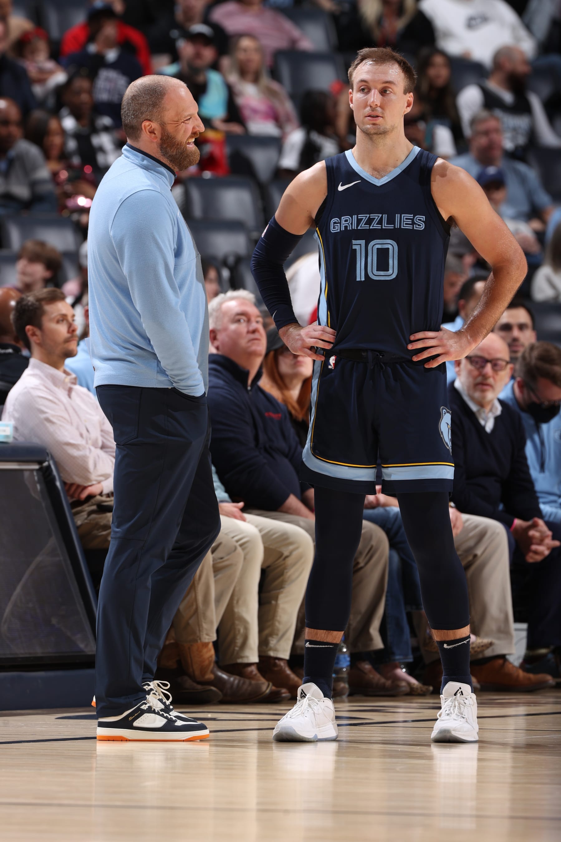 MEMPHIS, TN - FEBRUARY 14: Luke Kennard #10 talks with Head Coach Taylor Jenkins of the Memphis Grizzlies during the game against the Houston Rockets on February 14, 2024 at FedExForum in Memphis, Tennessee. NOTE TO USER: User expressly acknowledges and agrees that, by downloading and or using this photograph, User is consenting to the terms and conditions of the Getty Images License Agreement. Mandatory Copyright Notice: Copyright 2024 NBAE (Photo by Joe Murphy/NBAE via Getty Images)