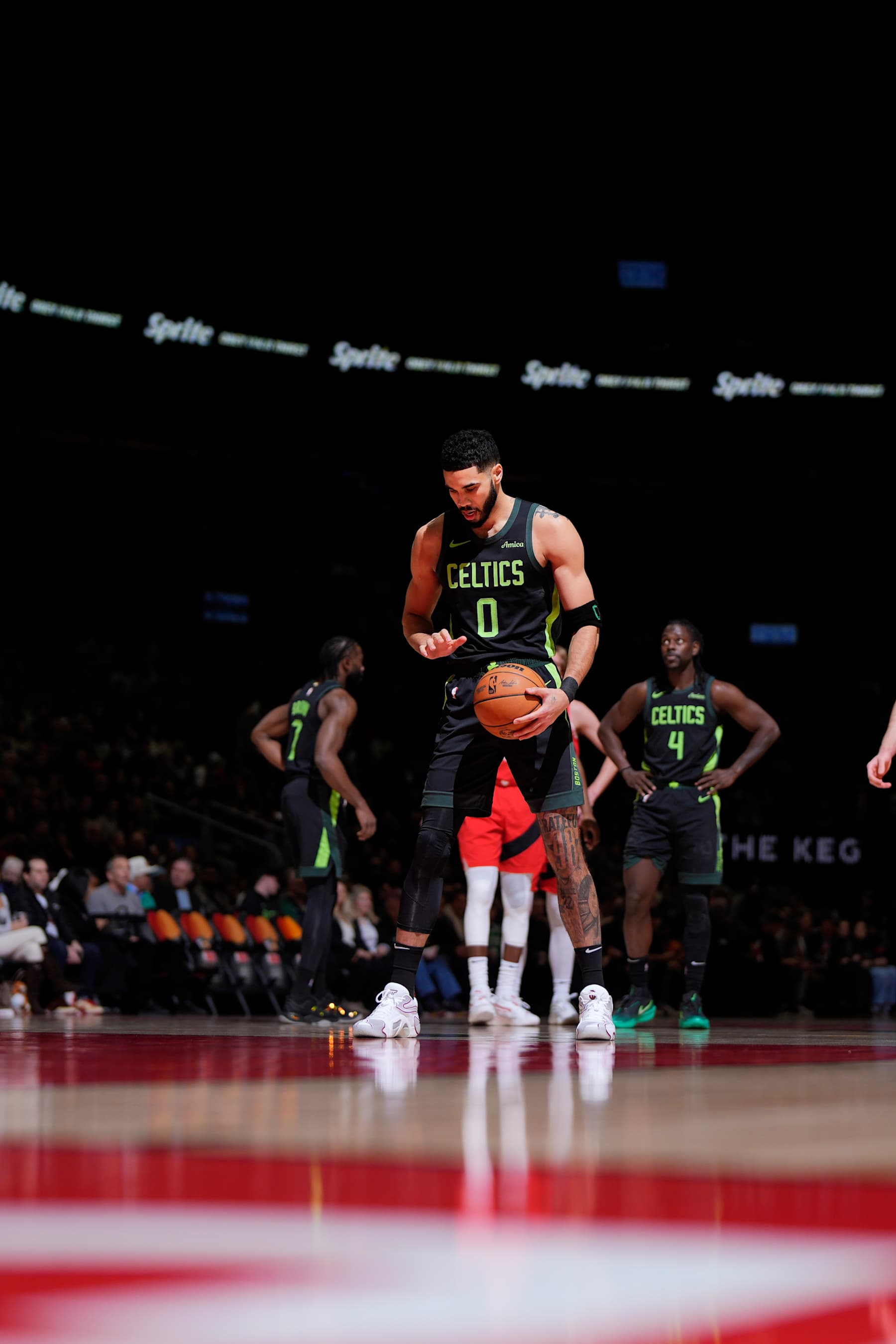 Jaylen Brown, Jayson Tatum and Jrue Holiday