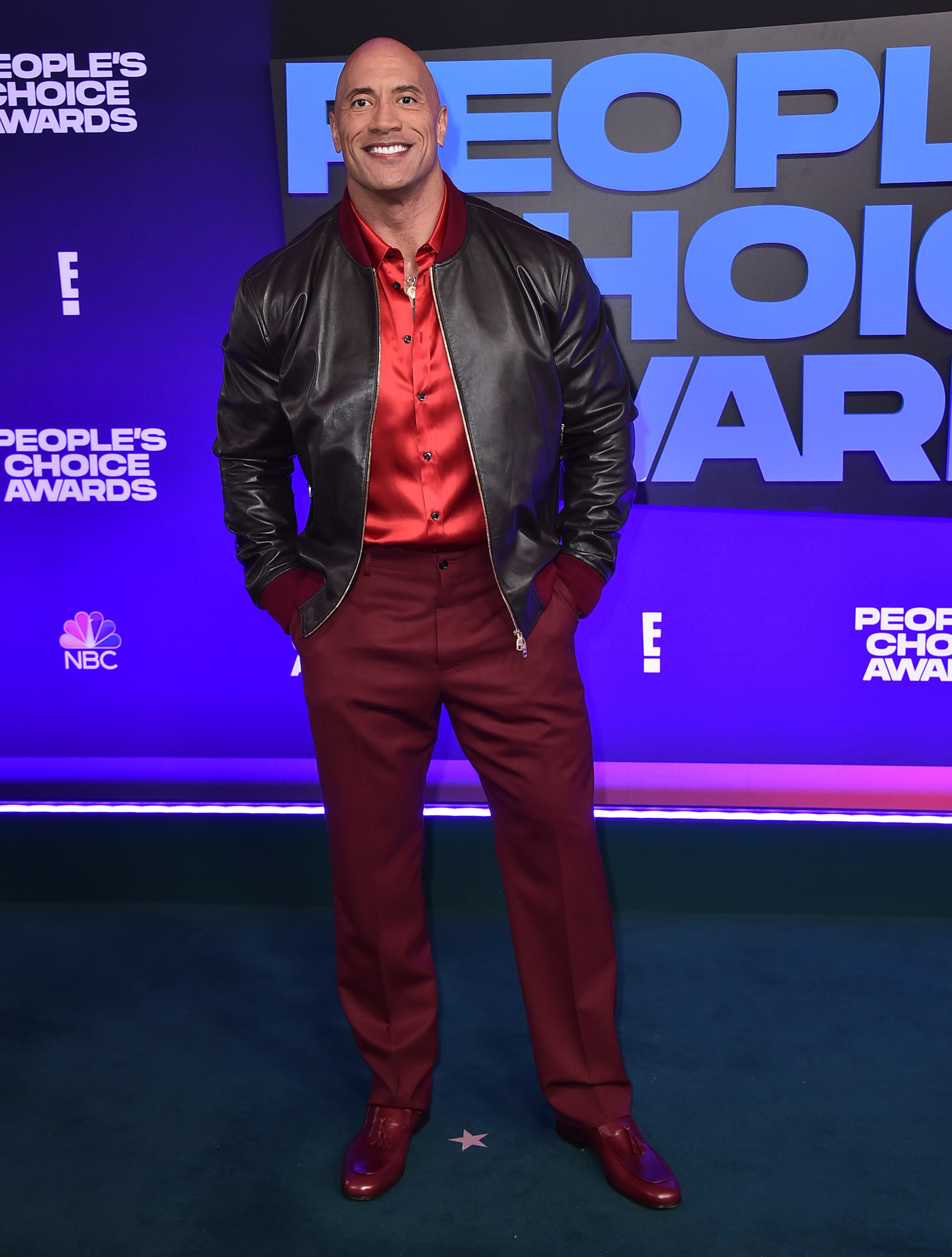 Dwayne "The Rock" Johnson arrives at the People's Choice Awards on Tuesday, Dec. 7, 2021, at the Barker Hangar in Santa Monica, Calif. (Photo by Jordan Strauss/Invision/AP)