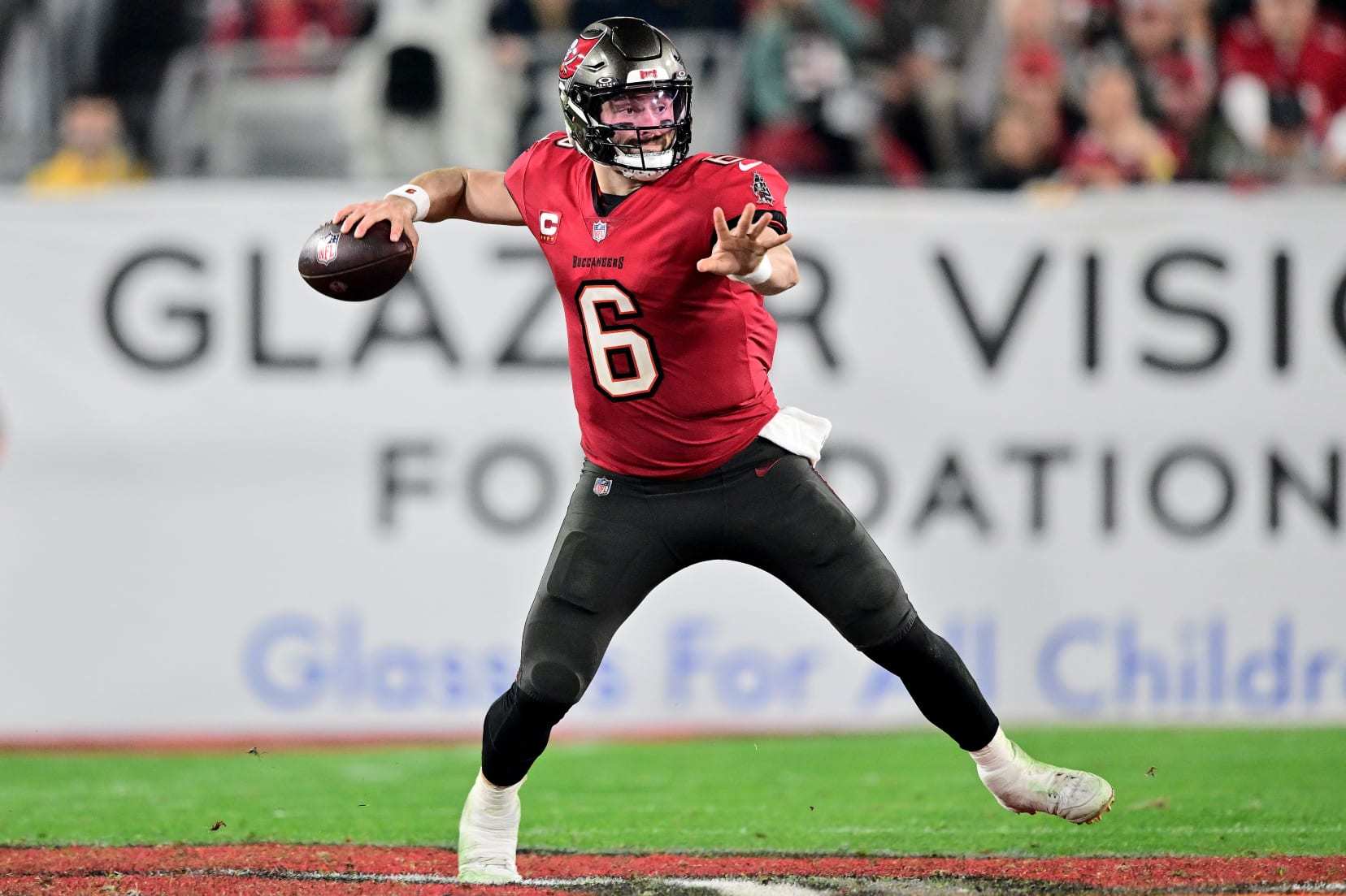 TAMPA, FLORIDA - JANUARY 15: Baker Mayfield #6 of the Tampa Bay Buccaneers throws a pass against the Philadelphia Eagles in the NFC Wild Card Playoffs at Raymond James Stadium on January 15, 2024 in Tampa, Florida. (Photo by Julio Aguilar/Getty Images)