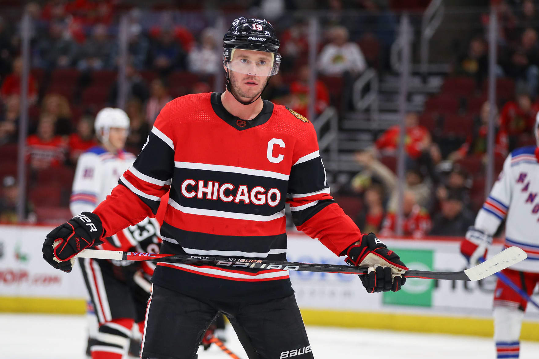 CHICAGO, IL - DECEMBER 18: Chicago Blackhawks Center Jonathan Toews (19) looks on during a game between the New York Rangers and the Chicago Blackhawks on December 18, 2022 at the United Center in Chicago, IL. (Photo by Melissa Tamez/Icon Sportswire via Getty Images)