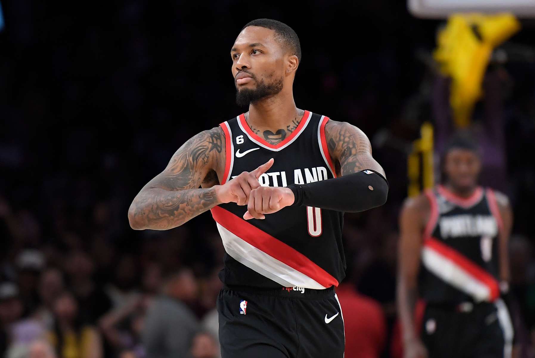 LOS ANGELES, CA - OCTOBER 23: Damian Lillard #0 of the Portland Trail Blazers celebrates as he points to his wrist after scoring a three-pot basket in the closing seconds of the game against Los Angeles Lakers at Crypto.com Arena on October 23, 2022 in Los Angeles, California. NOTE TO USER: User expressly acknowledges and agrees that, by downloading and or using this photograph, User is consenting to the terms and conditions of the Getty Images License Agreement.(Photo by Kevork Djansezian/Getty Images)(Photo by Kevork Djansezian/Getty Images)