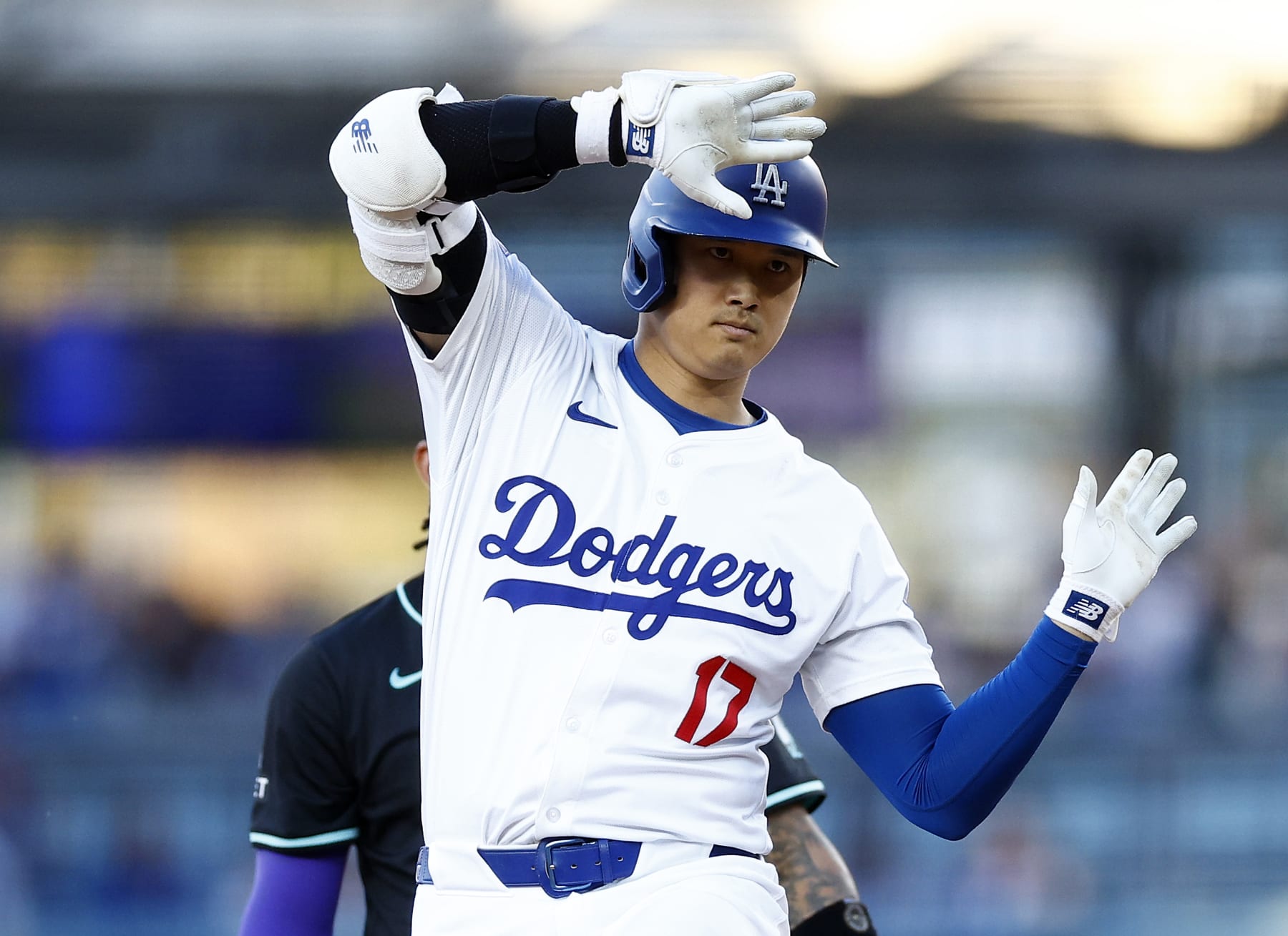 LOS ANGELES, CALIFORNIA - JULY 02:  Shohei Ohtani #17 of the Los Angeles Dodgers celebrates after hitting a double against the Arizona Diamondbacks in the first inning at Dodger Stadium on July 02, 2024 in Los Angeles, California. (Photo by Ronald Martinez/Getty Images)