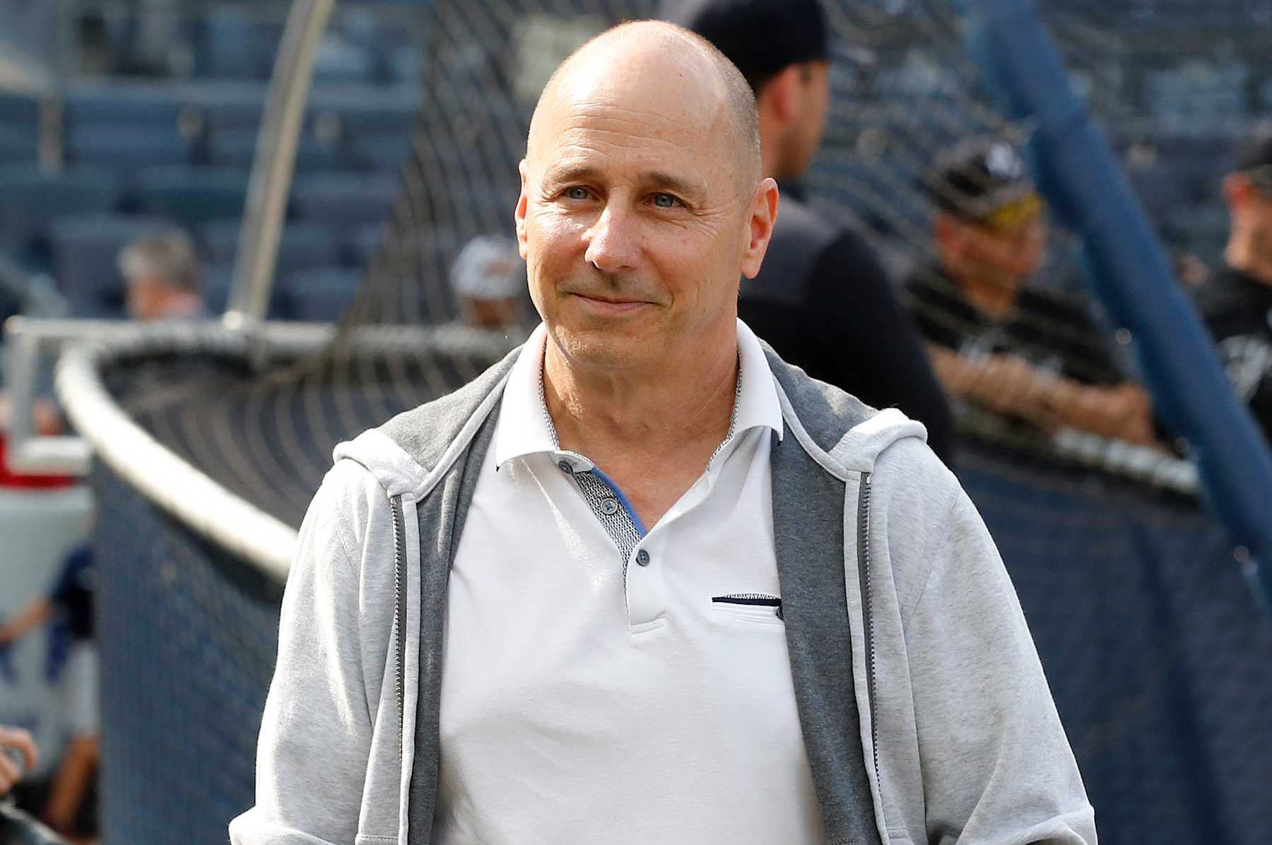NEW YORK, NEW YORK - JUNE 20:  (NEW YORK DAILIES OUT)  New York Yankees general manager Brian Cashman looks on during batting practice before a game between the Yankees and the Seattle Mariners at Yankee Stadium on June 20, 2023 in the Bronx borough of New York City. The Yankees defeated the Mariners 3-1. (Photo by Jim McIsaac/Getty Images)