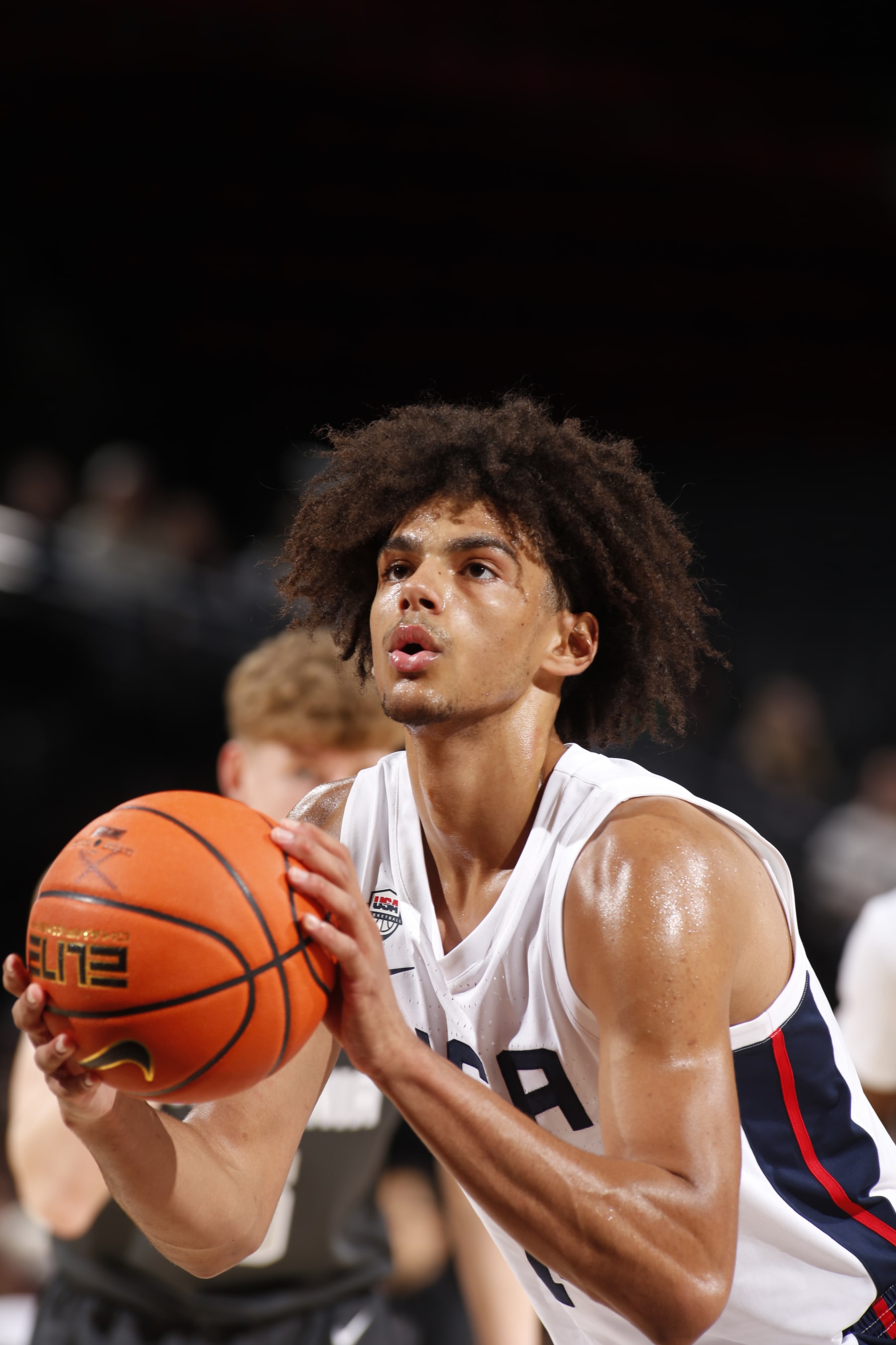 PORTLAND, OR - APRIL 13: Asa Newell #14 of Team USA shoots a free throw during the game against Team World during the 2024 Nike Hoop Summit on April 13, 2024 at the Moda Center Arena in Portland, Oregon. NOTE TO USER: User expressly acknowledges and agrees that, by downloading and or using this photograph, user is consenting to the terms and conditions of the Getty Images License Agreement. Mandatory Copyright Notice: Copyright 2024 NBAE (Photo by Cameron Browne/NBAE via Getty Images)