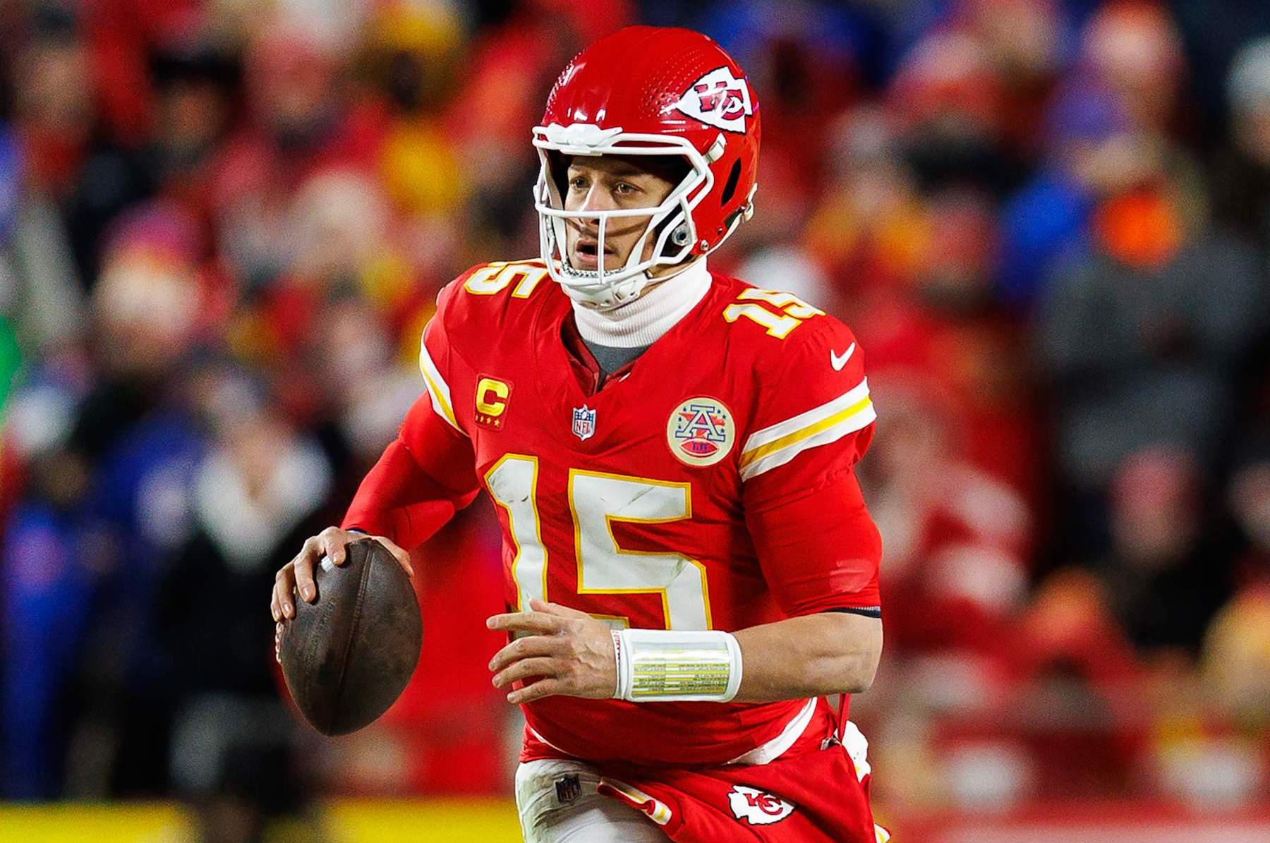 KANSAS CITY, MISSOURI - JANUARY 26: Quarterback Patrick Mahomes #15 of the Kansas City Chiefs scrambles out of the pocket during the second half of the AFC Championship football game against the Buffalo Bills, at GEHA Field at Arrowhead Stadium on January 26, 2025 in Kansas City, Missouri. (Photo by Brooke Sutton/Getty Images)