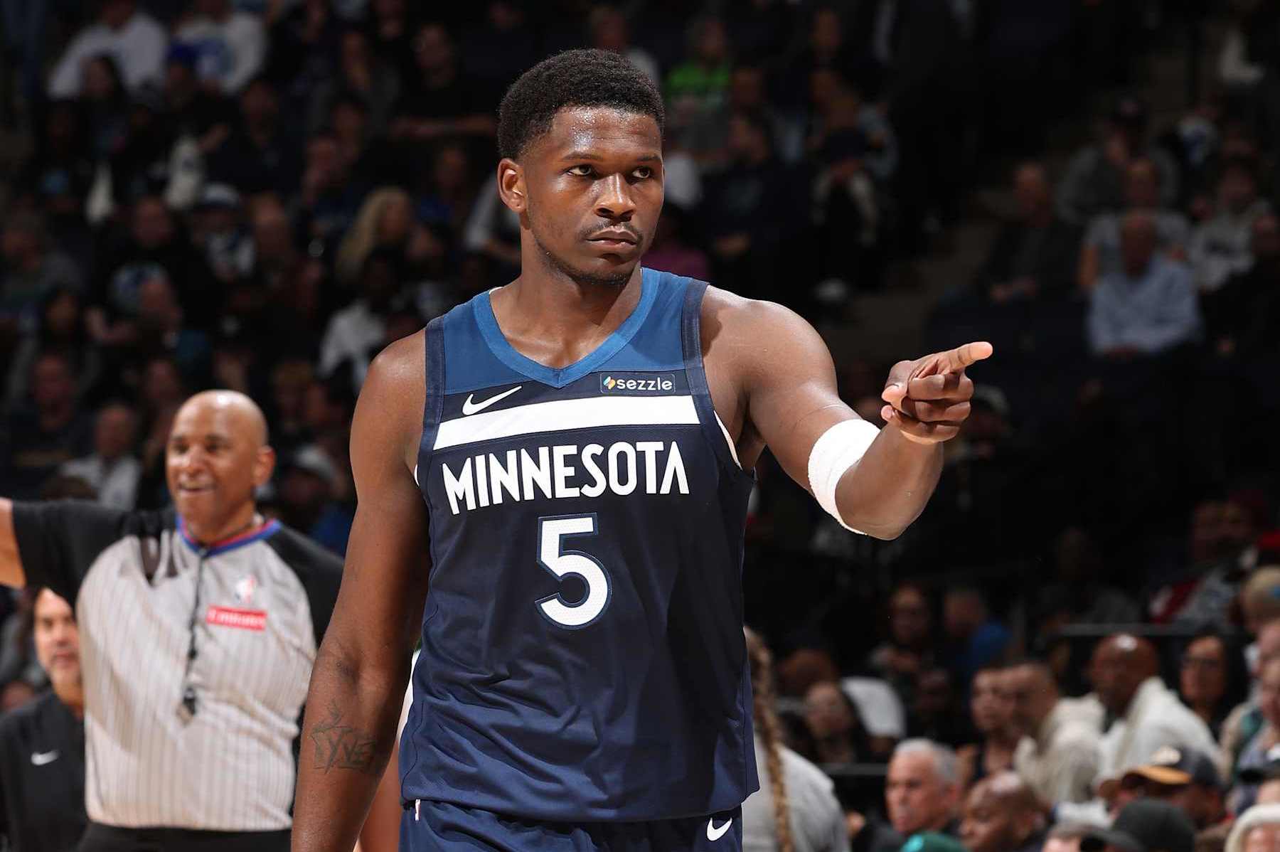 MINNEAPOLIS, MN -  NOVEMBER 10:  Anthony Edwards #5 of the Minnesota Timberwolves looks on during the game against the Miami Heaton November 10, 2024 at Target Center in Minneapolis, Minnesota. NOTE TO USER: User expressly acknowledges and agrees that, by downloading and or using this Photograph, user is consenting to the terms and conditions of the Getty Images License Agreement. Mandatory Copyright Notice: Copyright 2024 NBAE (Photo by David Sherman/NBAE via Getty Images)