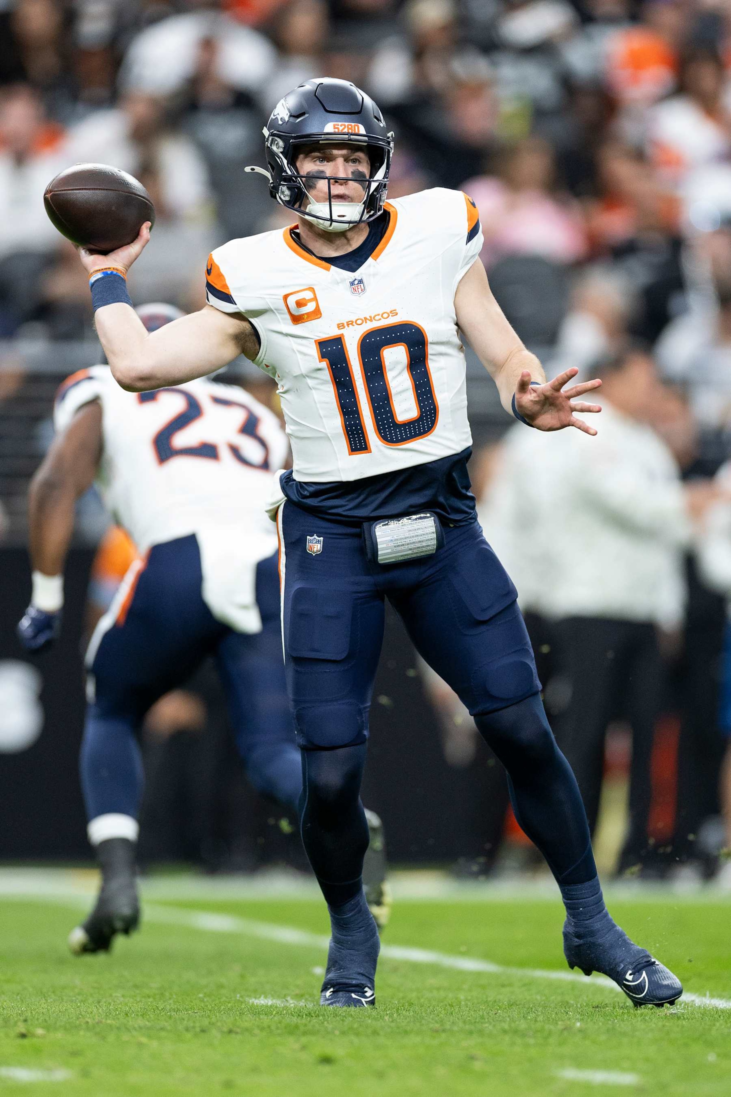 LAS VEGAS, NEVADA - NOVEMBER 24: Bo Nix #10 of the Denver Broncos looks to pass during an NFL Football game against the Las Vegas Raiders at Allegiant Stadium on November 24, 2024 in Las Vegas, Nevada. (Photo by Michael Owens/Getty Images) LAS VEGAS, NEVADA - NOVEMBER 24: Bo Nix #10 of the Denver Broncos looks to pass during an NFL Football game against the Las Vegas Raiders at Allegiant Stadium on November 24, 2024 in Las Vegas, Nevada. (Photo by Michael Owens/Getty Images)