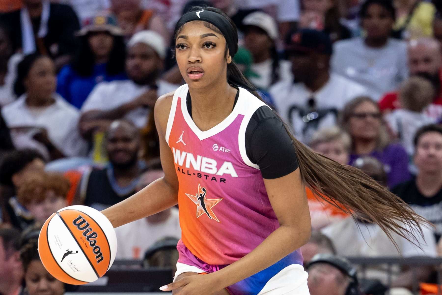 PHOENIX, AZ - JULY 20: Angel Reese #5 of Team WNBA dribbles the ball during the 2024 WNBA All Star Game at Footprint Center on July 20, 2024 in Phoenix, Arizona. NOTE TO USER: User expressly acknowledges and agrees that, by downloading and/or using this Photograph, user is consenting to the terms and conditions of the Getty Images License Agreement. Mandatory Copyright Notice: Copyright 2024 NBAE (Photo by Dylan Goodman/NBAE via Getty Images)