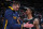 DENVER, CO - DECEMBER 20: Nikola Jokic #15 of the Denver Nuggets and Ja Morant #12 of the Memphis Grizzlies hug after the game on December 20, 2022 at the Ball Arena in Denver, Colorado. NOTE TO USER: User expressly acknowledges and agrees that, by downloading and/or using this Photograph, user is consenting to the terms and conditions of the Getty Images License Agreement. Mandatory Copyright Notice: Copyright 2022 NBAE (Photo by Garrett Ellwood/NBAE via Getty Images)