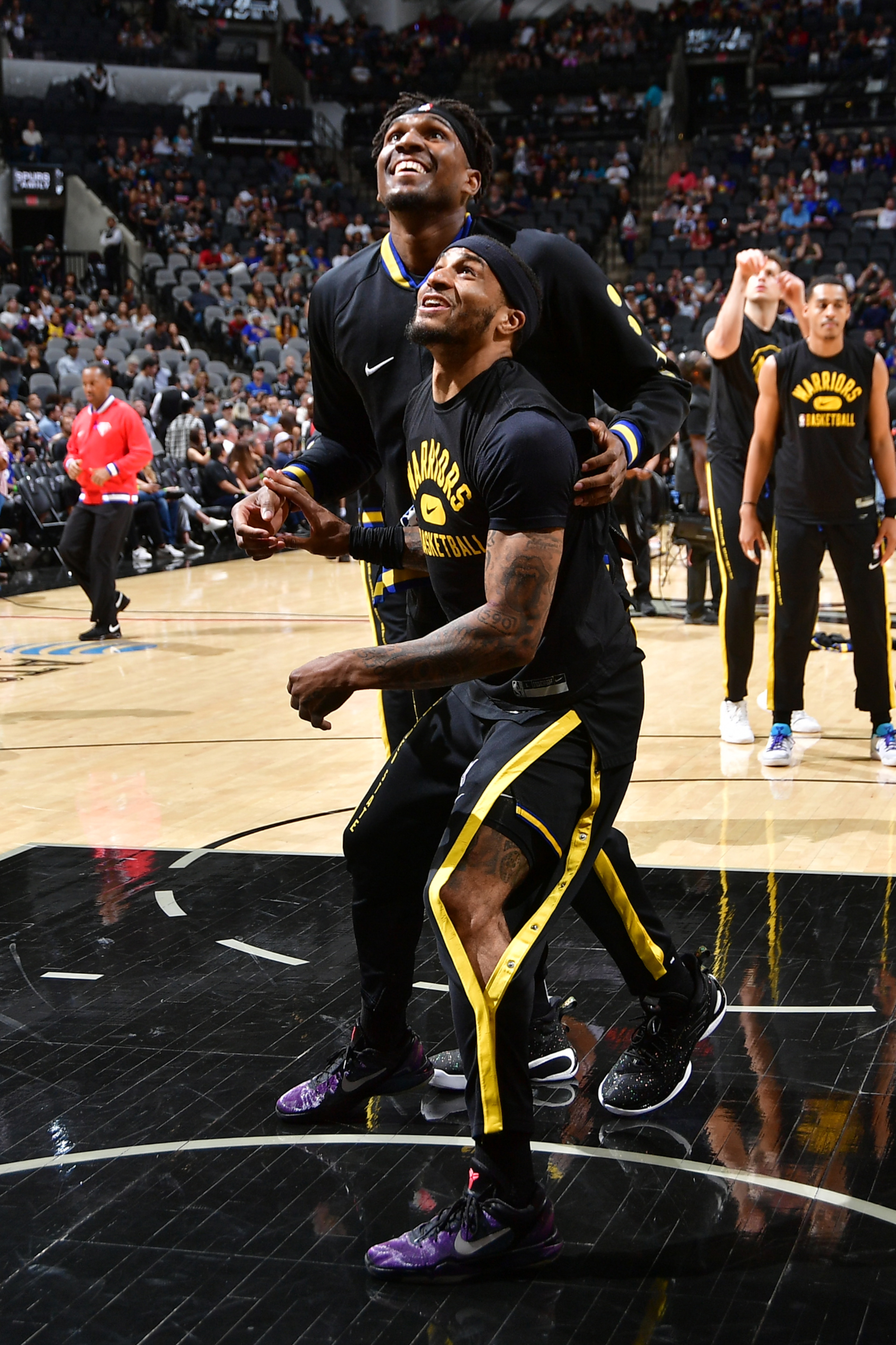 SAN ANTONIO, TX -APRIL 9: Kevon Looney #5 of the Golden State Warriors and Gary Payton II #0 of the Golden State Warriors smile before the game against the San Antonio Spurs on April 9, 2022 at the AT&T Center in San Antonio, Texas. NOTE TO USER: User expressly acknowledges and agrees that, by downloading and or using this photograph, user is consenting to the terms and conditions of the Getty Images License Agreement. Mandatory Copyright Notice: Copyright 2022 NBAE (Photos by Michael Gonzales/NBAE via Getty Images) SAN ANTONIO, TX -APRIL 9: Kevon Looney #5 of the Golden State Warriors and Gary Payton II #0 of the Golden State Warriors smile before the game against the San Antonio Spurs on April 9, 2022 at the AT&T Center in San Antonio, Texas. NOTE TO USER: User expressly acknowledges and agrees that, by downloading and or using this photograph, user is consenting to the terms and conditions of the Getty Images License Agreement. Mandatory Copyright Notice: Copyright 2022 NBAE (Photos by Michael Gonzales/NBAE via Getty Images)