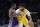 LOS ANGELES, CA - OCTOBER 03: Anthony Davis #3 of the Los Angeles Lakers is defended by De'Aaron Fox #5 of the Sacramento Kings during the first half at Crypto.com Arena on October 3, 2022 in Los Angeles, California. (Photo by Kevork Djansezian/Getty Images)