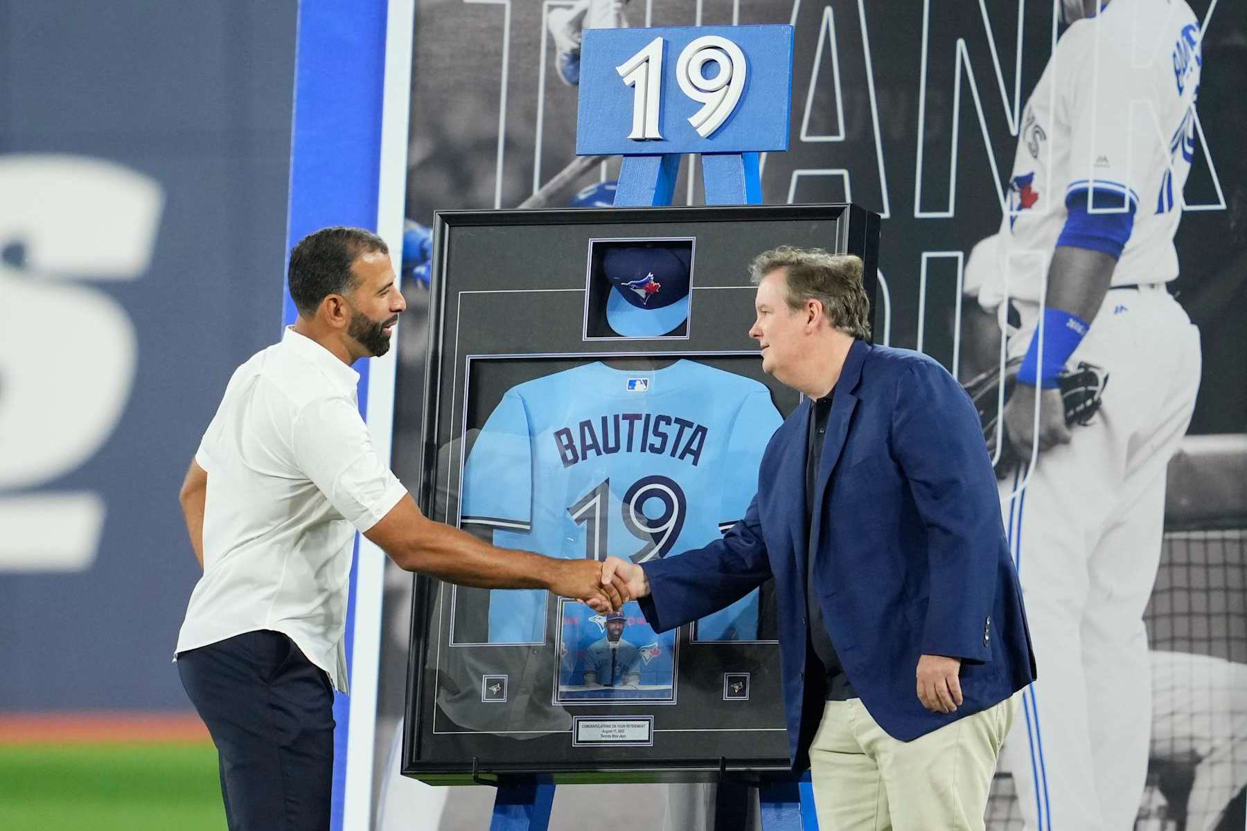 José Bautista (left) and Edward Rogers (right) in August 2023