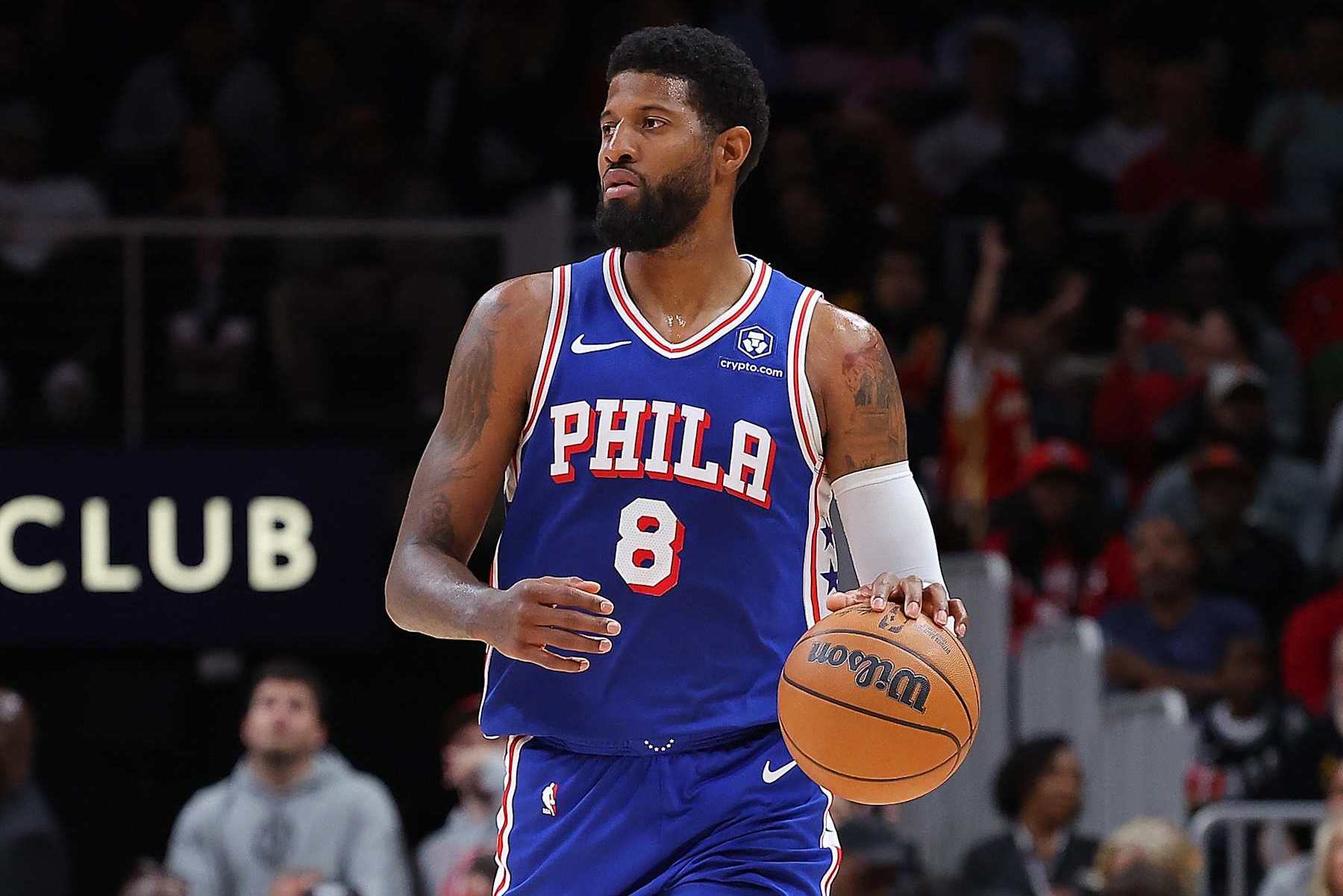 ATLANTA, GEORGIA - OCTOBER 14:  Paul George #8 of the Philadelphia 76ers brings the ball up the court against the Atlanta Hawks during the second quarter at State Farm Arena on October 14, 2024 in Atlanta, Georgia.  NOTE TO USER: User expressly acknowledges and agrees that, by downloading and/or using this photograph, user is consenting to the terms and conditions of the Getty Images License Agreement.  (Photo by Kevin C. Cox/Getty Images)