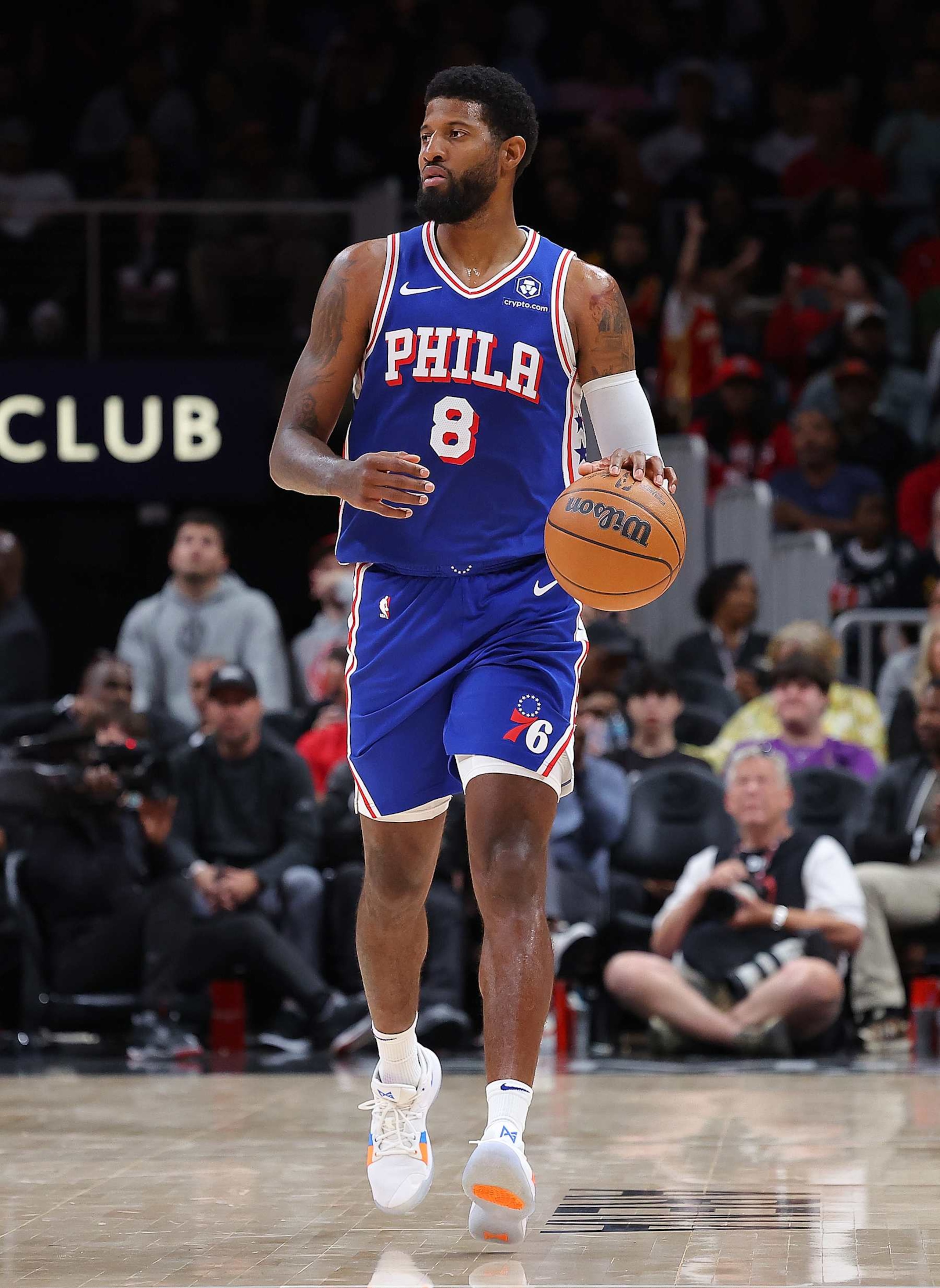 ATLANTA, GEORGIA - OCTOBER 14:  Paul George #8 of the Philadelphia 76ers brings the ball up the court against the Atlanta Hawks during the second quarter at State Farm Arena on October 14, 2024 in Atlanta, Georgia.  NOTE TO USER: User expressly acknowledges and agrees that, by downloading and/or using this photograph, user is consenting to the terms and conditions of the Getty Images License Agreement.  (Photo by Kevin C. Cox/Getty Images)