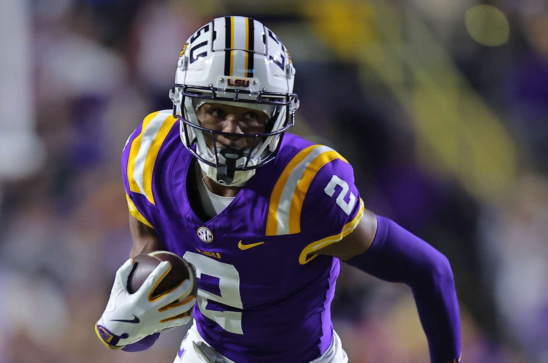 BATON ROUGE, LOUISIANA - NOVEMBER 30: Kyren Lacy #2 of the LSU Tigers in action against the Oklahoma Sooners during a game at Tiger Stadium on November 30, 2024 in Baton Rouge, Louisiana. (Photo by Jonathan Bachman/Getty Images)