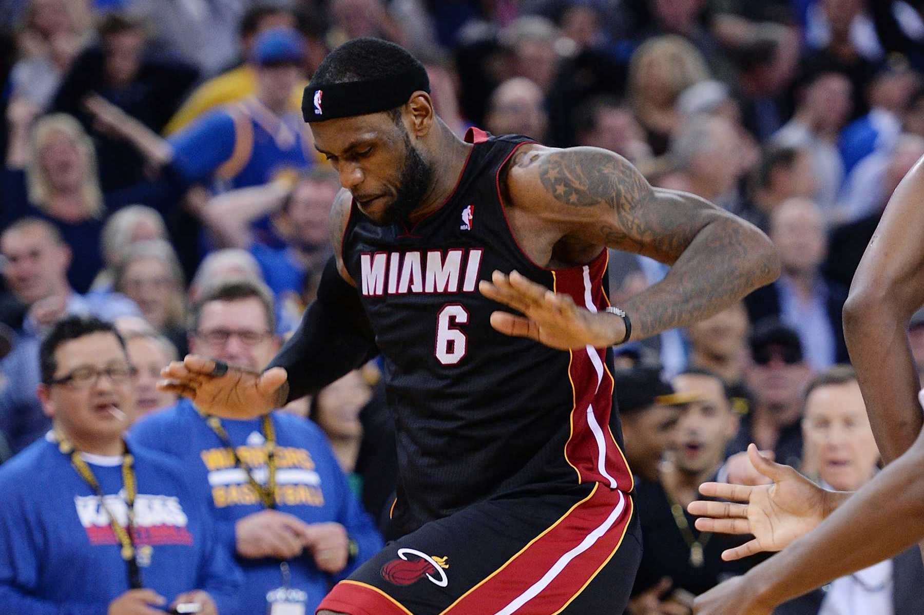OAKLAND, CA - FEBRUARY 12: LeBron James #6 of the Miami Heat celebrates after hitting a three-point shot to go ahead of the Golden State Warriors 111-110 and leaving less then 0.02 seconds on the clock in the fourth quarter at ORACLE Arena on February 12, 2014 in Oakland, California. NOTE TO USER: User expressly acknowledges and agrees that, by downloading and or using this photograph, User is consenting to the terms and conditions of the Getty Images License Agreement. (Photo by Thearon W. Henderson/Getty Images)