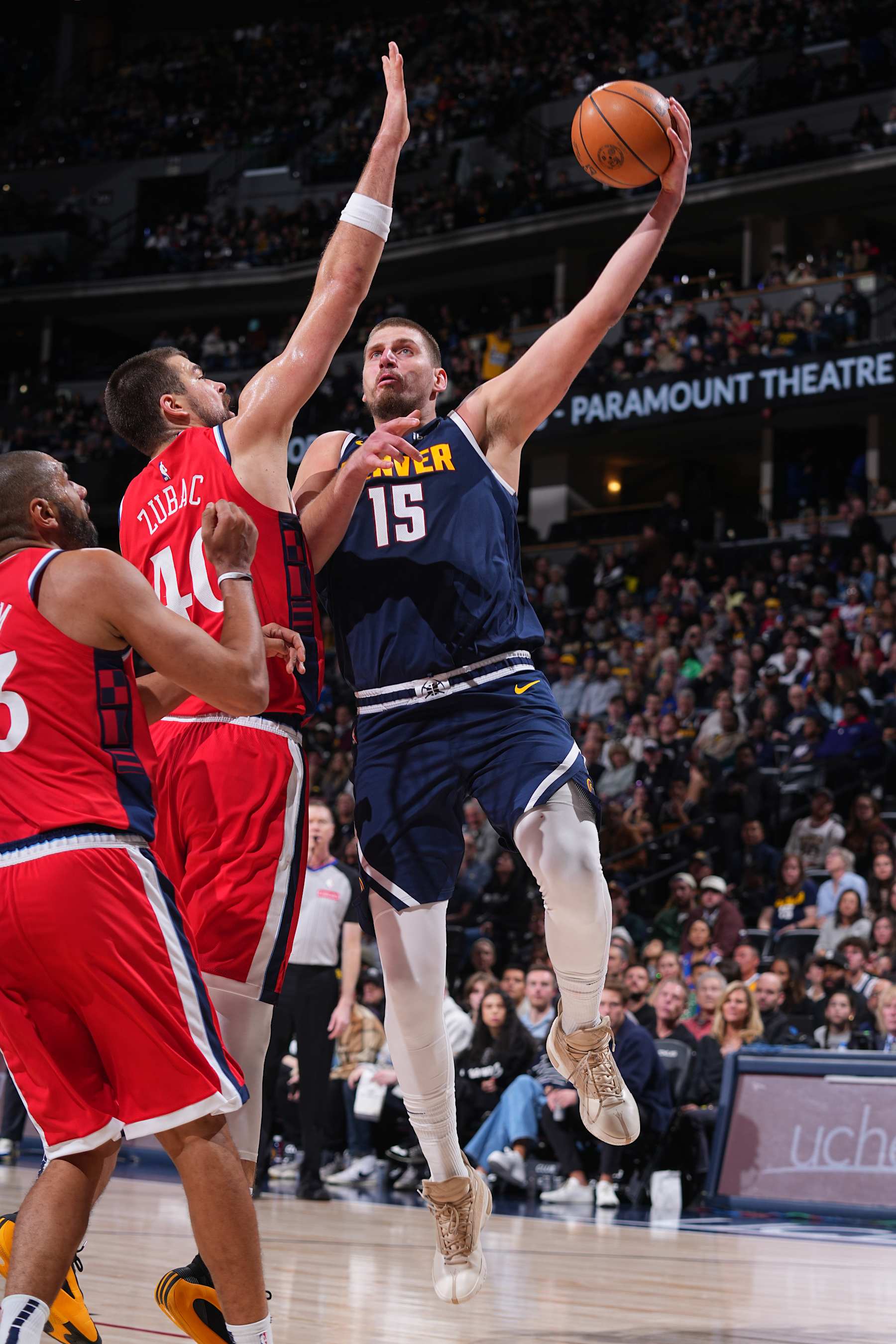 DENVER, CO - DECEMBER 13: Nikola Jokic #15 of the Denver Nuggets drives to the basket during the game against the LA Clippers on December 13, 2024 at Ball Arena in Denver, Colorado. NOTE TO USER: User expressly acknowledges and agrees that, by downloading and/or using this Photograph, user is consenting to the terms and conditions of the Getty Images License Agreement. Mandatory Copyright Notice: Copyright 2024 NBAE (Photo by Bart Young/NBAE via Getty Images)