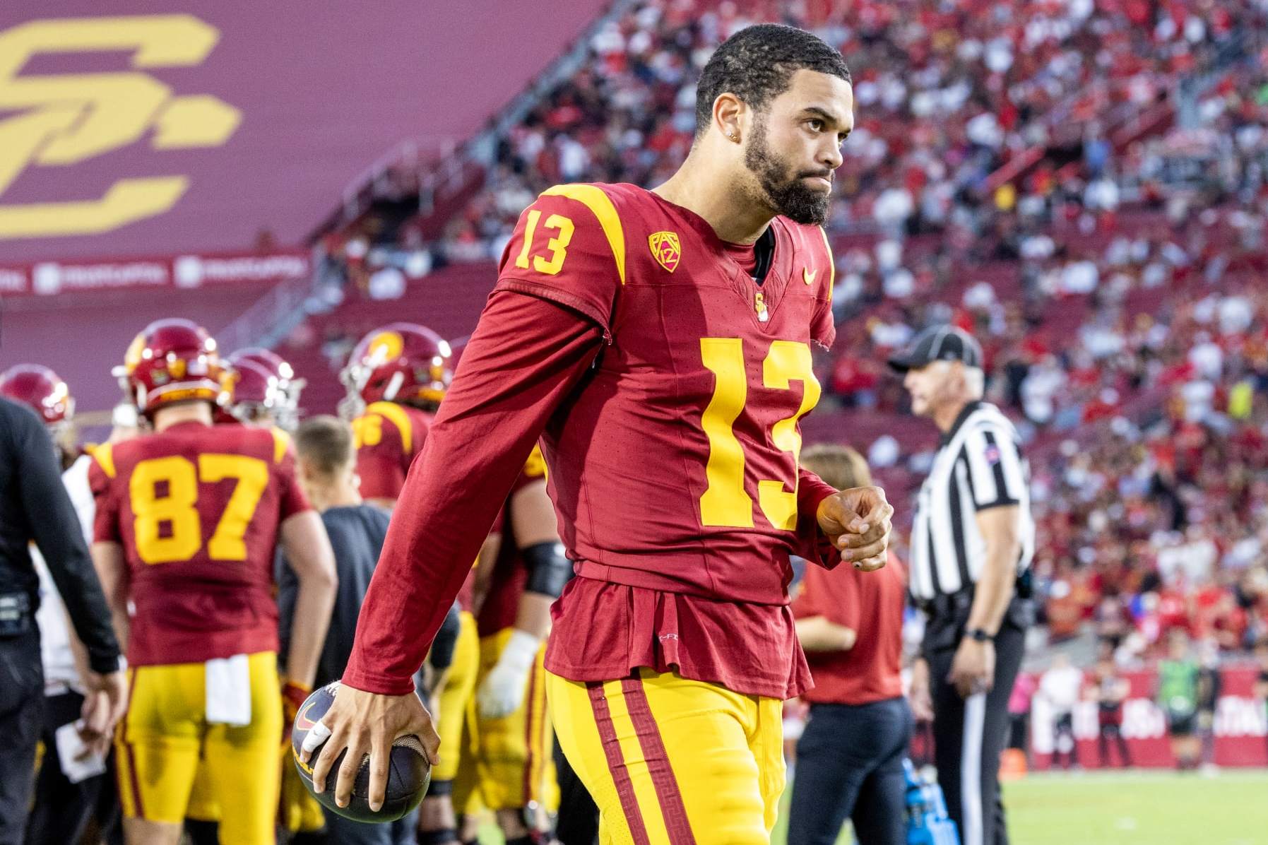 LOS ANGELES, CA  - OCTOBER 21, 2023: USC Trojans  quarterback Caleb Williams stays loose during a timeout in  the 34-32 loss to Utah at LA Memorial Coliseum on October 21,  2023 in Los Angeles, California.(Gina Ferazzi / Los Angeles Times via Getty Images)