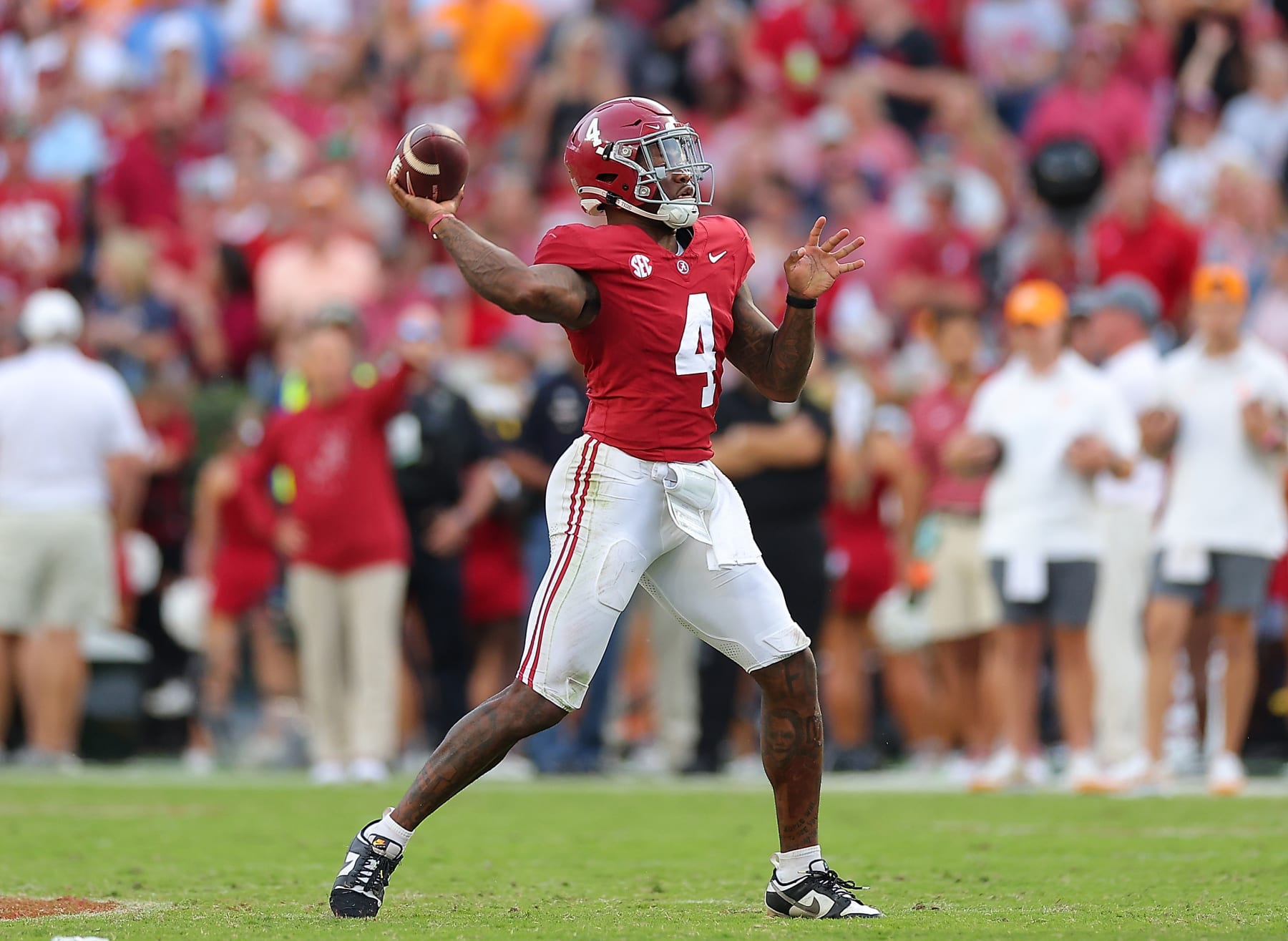 TUSCALOOSA, ALABAMA - OCTOBER 21:  Jalen Milroe #4 of the Alabama Crimson Tide looks to pass against the tduring the fourth quarter at Bryant-Denny Stadium on October 21, 2023 in Tuscaloosa, Alabama. (Photo by Kevin C. Cox/Getty Images)