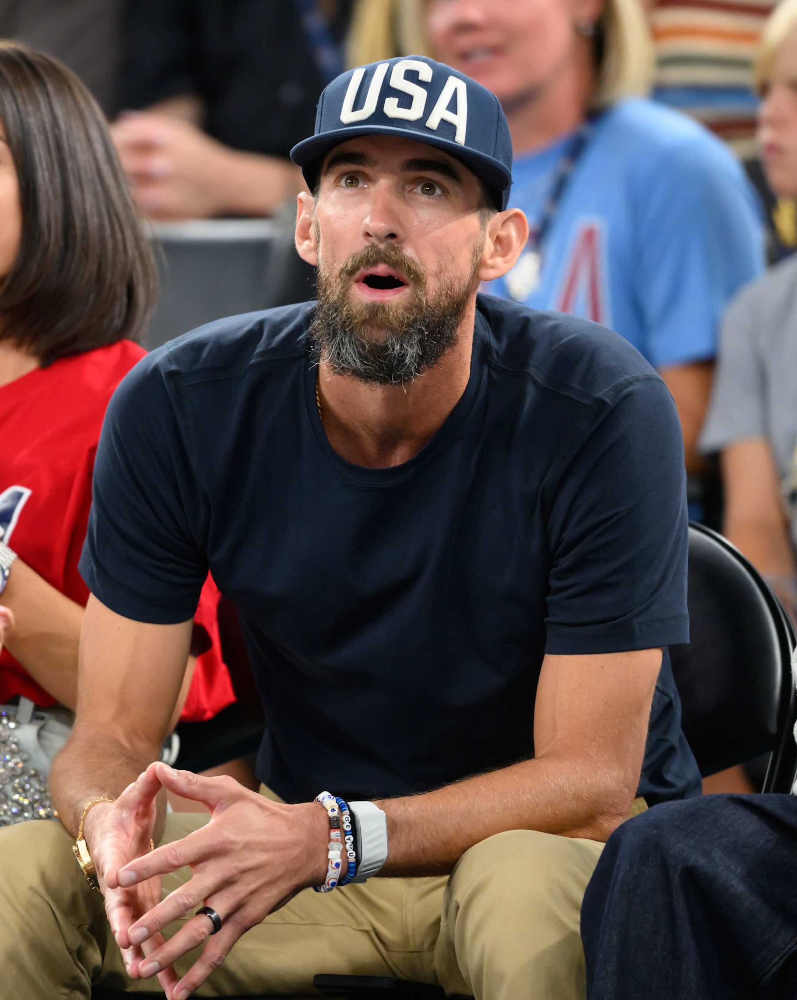 PARIS, FRANCE - AUGUST 07: Michael Phelps attends the women's basketball quarterfinal game between Team United States and Team Nigeria on day twelve of the Olympic Games Paris 2024 at Bercy Arena on August 07 2024 in Paris, France. (Photo by Karwai Tang/Getty Images)