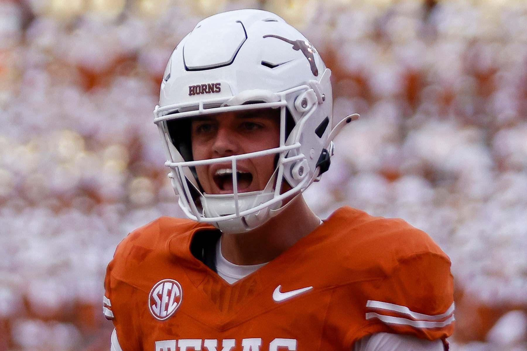 AUSTIN, TX - SEPTEMBER 14: Texas Longhorns quarterback Arch Manning (16) reacts after throwing a touchdown during the first half of the game against the UTSA Roadrunners on September 14, 2024, at Darrell K Royal - Texas Memorial Stadium in Austin, TX. (Photo by Adam Davis/Icon Sportswire via Getty Images)