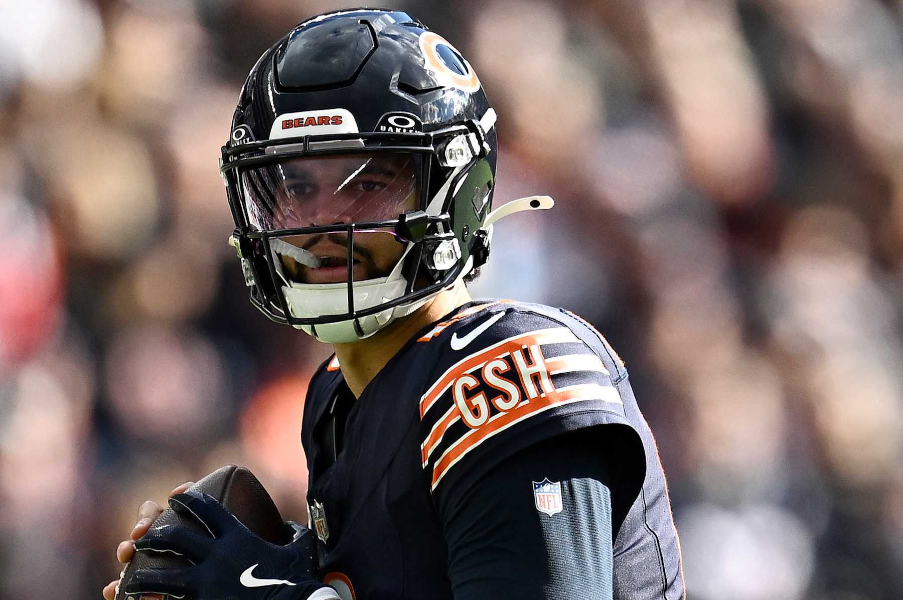 CHICAGO, ILLINOIS - NOVEMBER 10: Caleb Williams #18 of the Chicago Bears looks to pass the ball against the New England Patriots during the second quarter at Soldier Field on November 10, 2024 in Chicago, Illinois. (Photo by Quinn Harris/Getty Images)