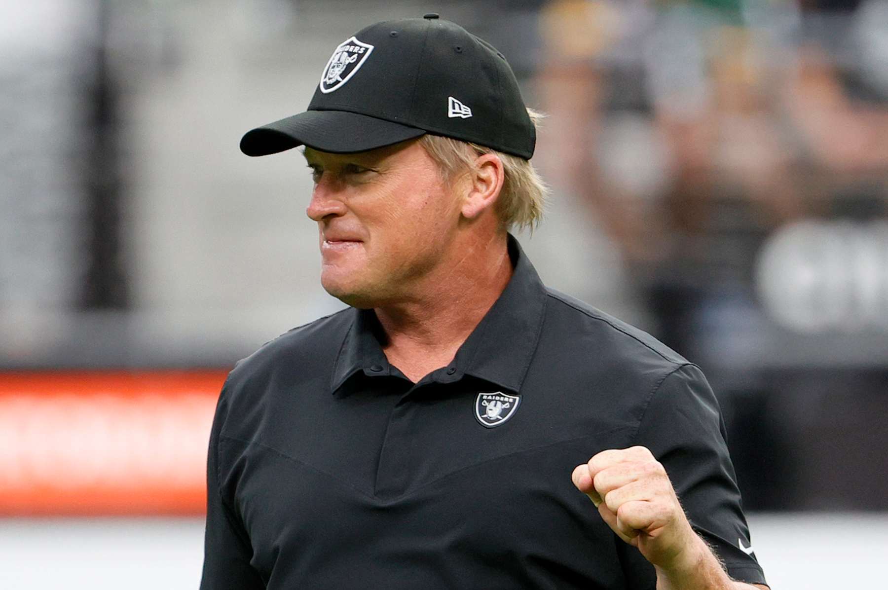LAS VEGAS, NEVADA - OCTOBER 10:  Head coach Jon Gruden of the Las Vegas Raiders walks on the field before a game against the Chicago Bears at Allegiant Stadium on October 10, 2021 in Las Vegas, Nevada. The Bears defeated the Raiders 20-9.  (Photo by Ethan Miller/Getty Images)
