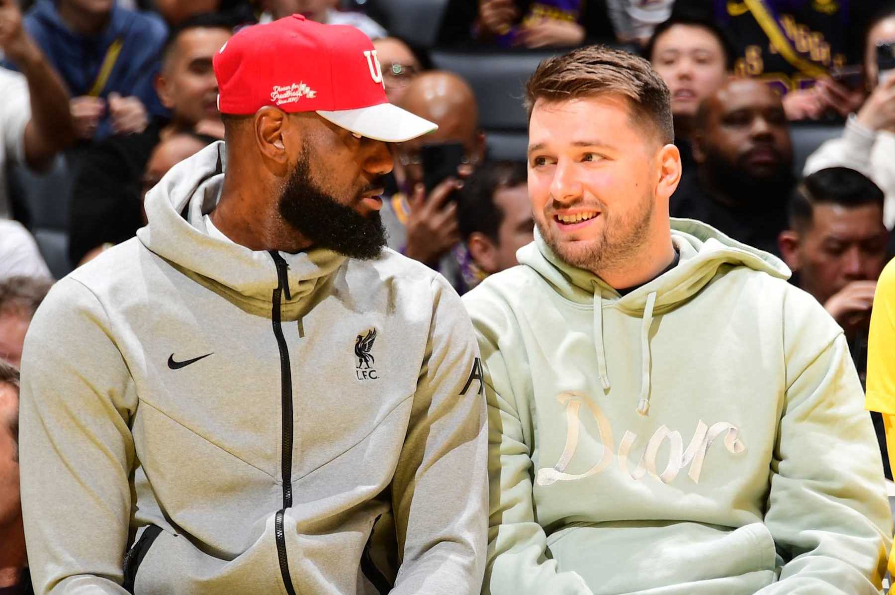 LOS ANGELES, CA - FEBRUARY 8: LeBron James #23 and Luka Doncic #77 of the Los Angeles Lakers looks on during the game against the Indiana Pacers on February 8, 2025 at Crypto.Com Arena in Los Angeles, California. NOTE TO USER: User expressly acknowledges and agrees that, by downloading and/or using this Photograph, user is consenting to the terms and conditions of the Getty Images License Agreement. Mandatory Copyright Notice: Copyright 2025 NBAE (Photo by Adam Pantozzi/NBAE via Getty Images)