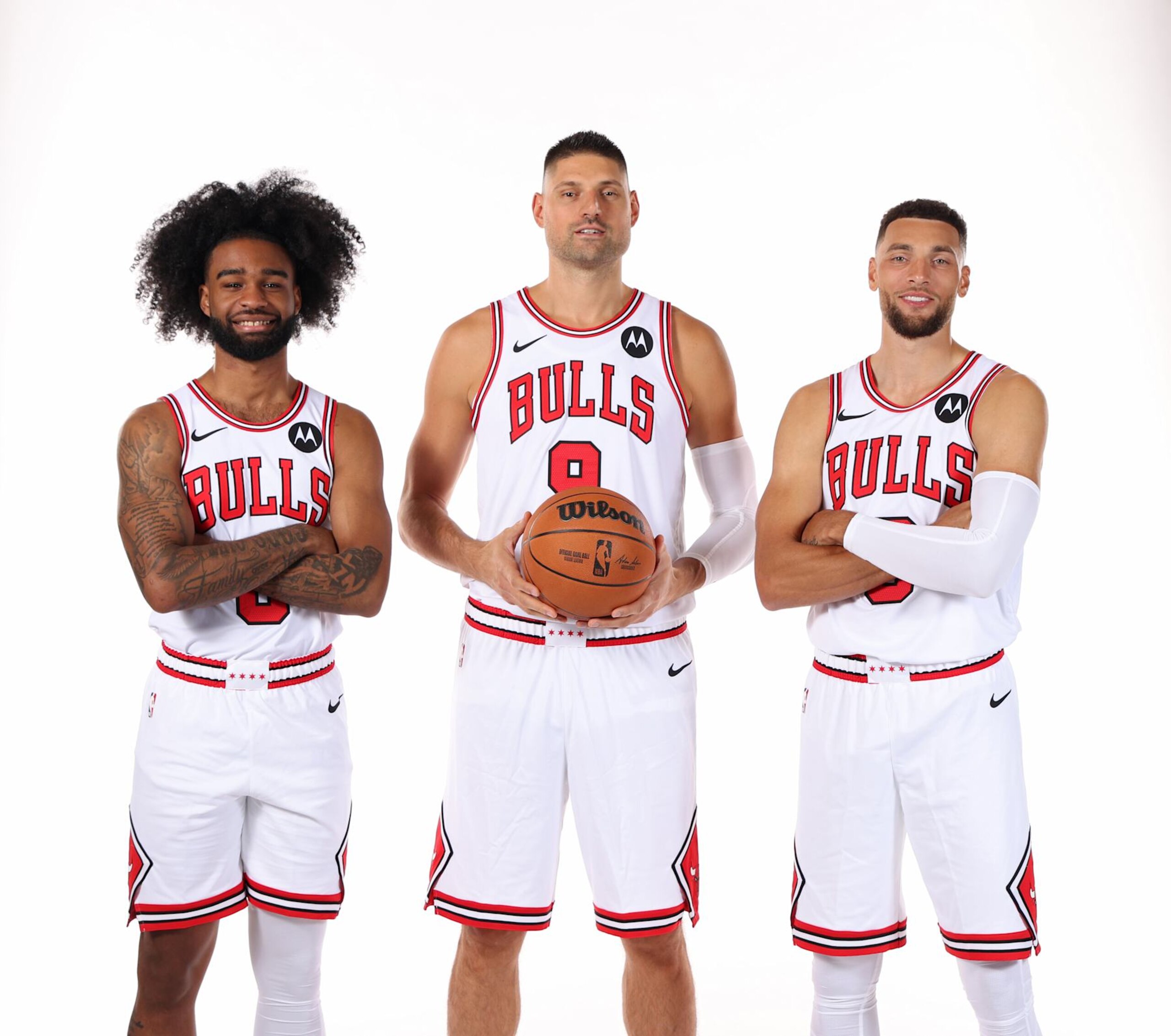 CHICAGO, IL - SEPTEMBER 30: Coby White #0, Nikola Vucevic #9, and Zach LaVine #8 of the Chicago Bulls poses for a portrait during NBA media day on September 30, 2024 at the United Center in Chicago, Illlinois. NOTE TO USER: User expressly acknowledges and agrees that, by downloading and or using this photograph, User is consenting to the terms and conditions of the Getty Images License Agreement. Mandatory Copyright Notice: Copyright 2024 NBAE (Photo by Jeff Haynes/NBAE via Getty Images)