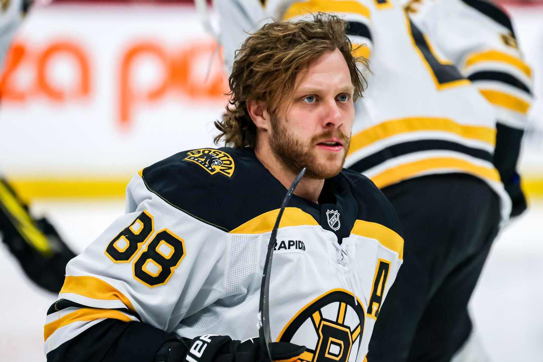 WINNIPEG, CANADA - DECEMBER 10: David Pastrnak #88 of the Boston Bruins looks on during the pre-game warm up prior to NHL action against the Winnipeg Jets at the Canada Life Centre on December 10, 2024 in Winnipeg, Manitoba, Canada. (Photo by Jonathan Kozub/NHLI via Getty Images)