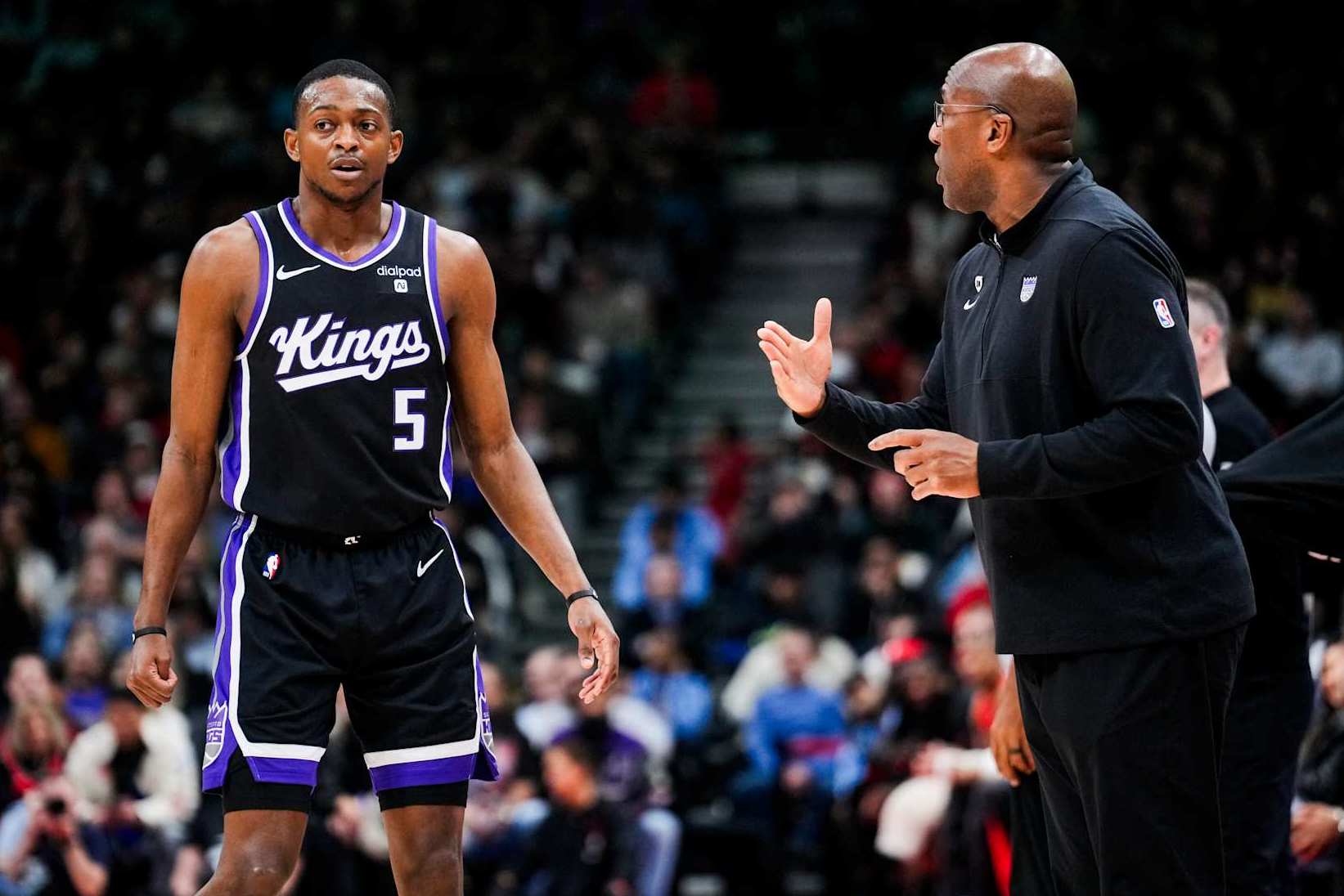 TORONTO, ON - MARCH 20: De'Aaron Fox #5 of the Sacramento Kings speaks to head coach Mike Brown in a break against the Toronto Raptors during the first half of their basketball game at the Scotiabank Arena on March 20, 2024 in Toronto, Ontario, Canada. NOTE TO USER: User expressly acknowledges and agrees that, by downloading and/or using this Photograph, user is consenting to the terms and conditions of the Getty Images License Agreement. (Photo by Mark Blinch/Getty Images)