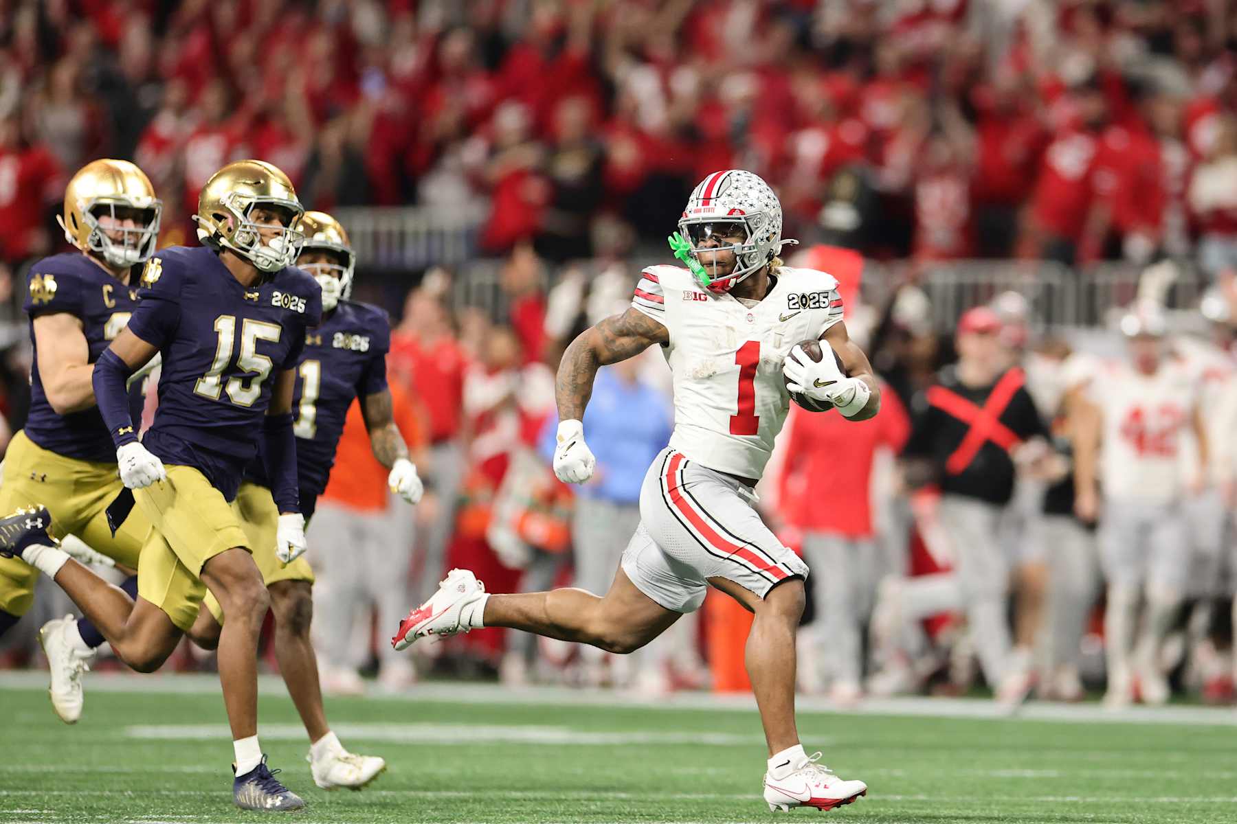 Ohio State's Quinshon Judkins runs for a touchdown in the National Championship Game against the Notre Dame Fighting Irish. 