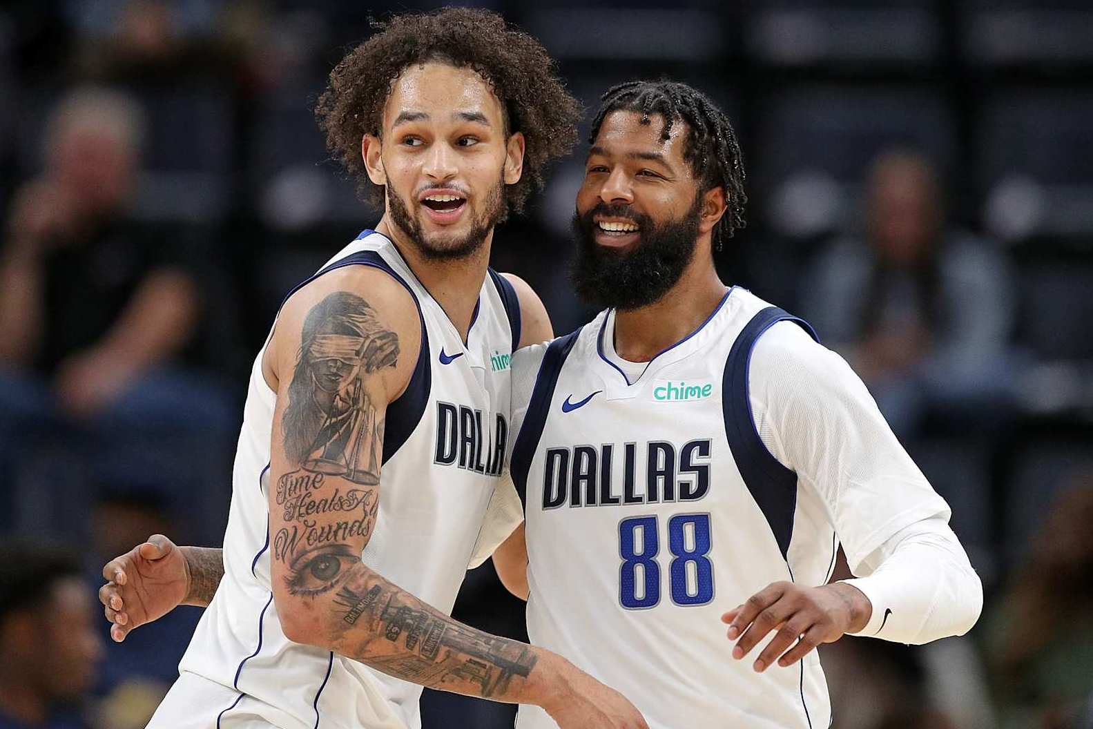 MEMPHIS, TENNESSEE - DECEMBER 11: Dereck Lively II #2 of the Dallas Mavericks and Markieff Morris #88 of the Dallas Mavericks during the second half against the Memphis Grizzlies at FedExForum on December 11, 2023 in Memphis, Tennessee. NOTE TO USER: User expressly acknowledges and agrees that, by downloading and or using this photograph, User is consenting to the terms and conditions of the Getty Images License Agreement. (Photo by Justin Ford/Getty Images)