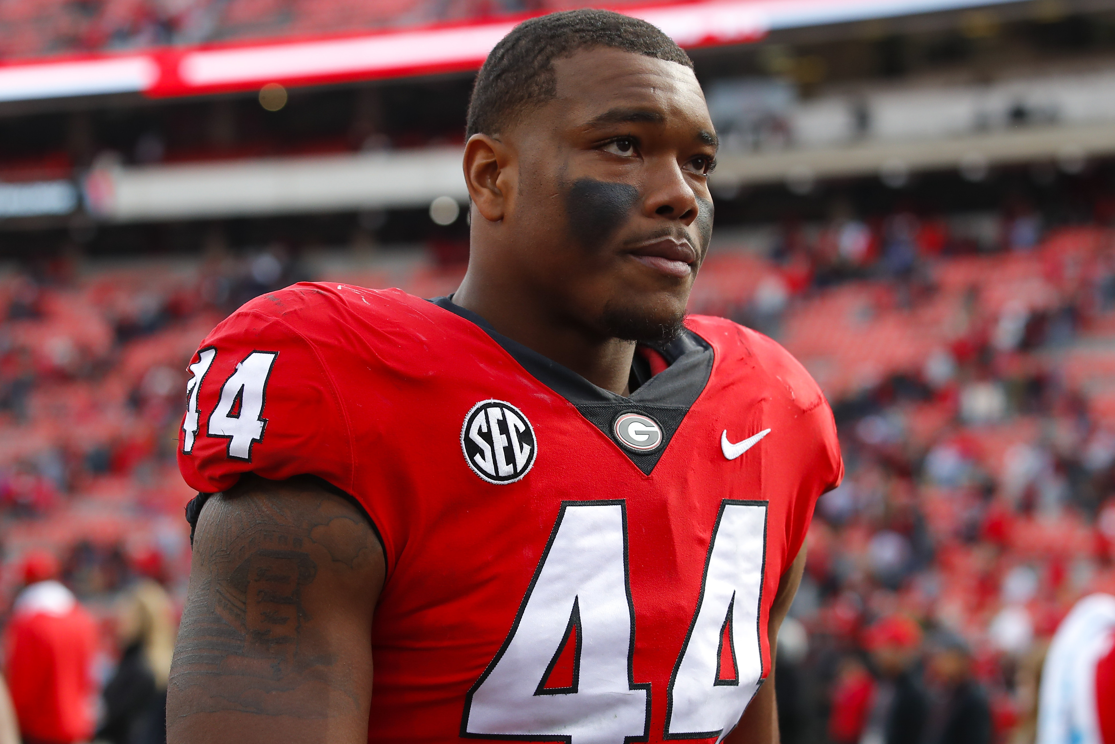 ATHENS, GA - NOVEMBER 06: Travon Walker #44 of the Georgia Bulldogs leaves the field at the conclusion of the game against the Missouri Tigers at Sanford Stadium on November 6, 2021 in Athens, Georgia. (Photo by Todd Kirkland/Getty Images)