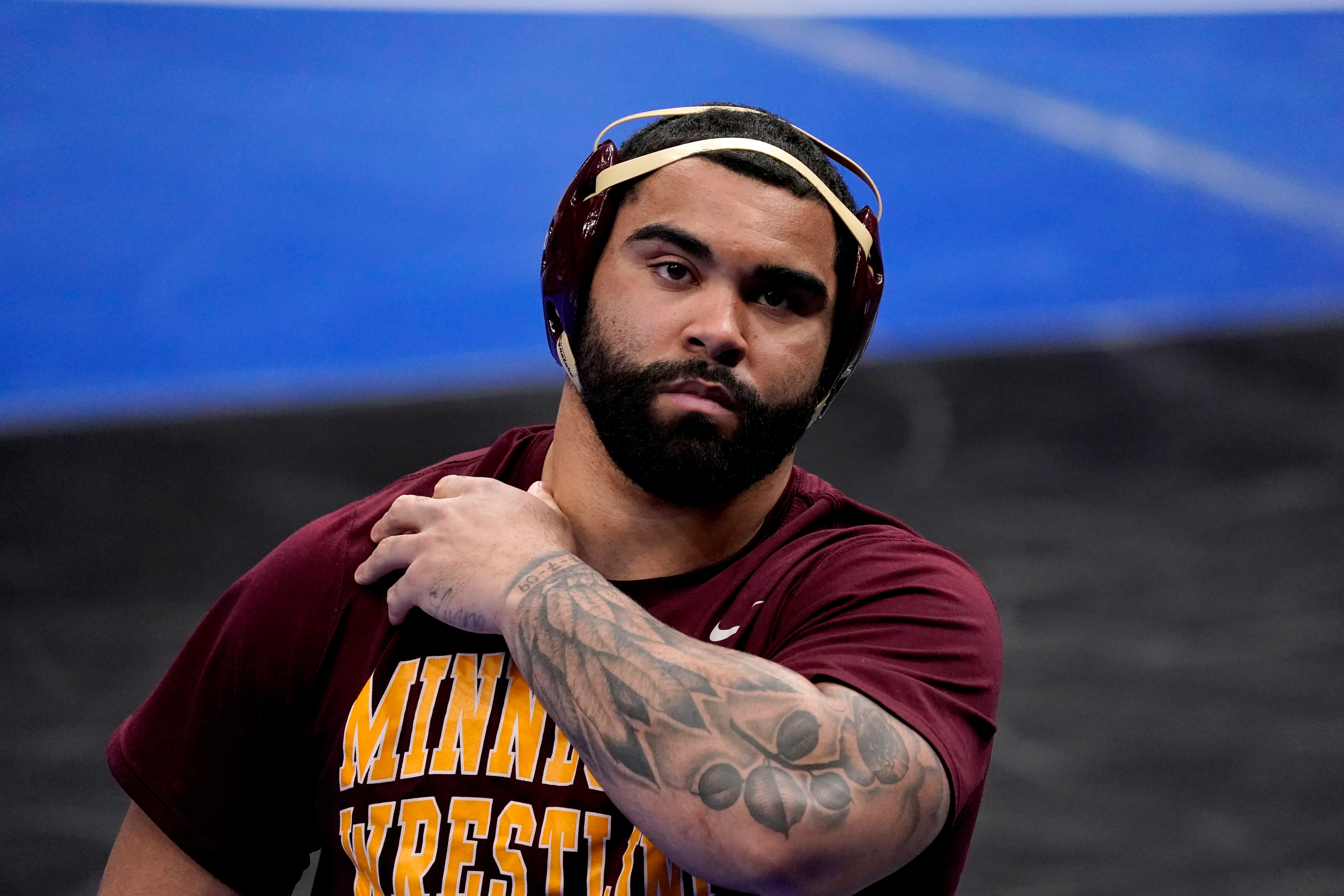 Minnesota's Gable Steveson prepares to take on Penn State's Greg Kerkvliet during their 285-pound match in the quarterfinal round of the NCAA wrestling championships Friday, March 19, 2021, in St. Louis. (AP Photo/Jeff Roberson)