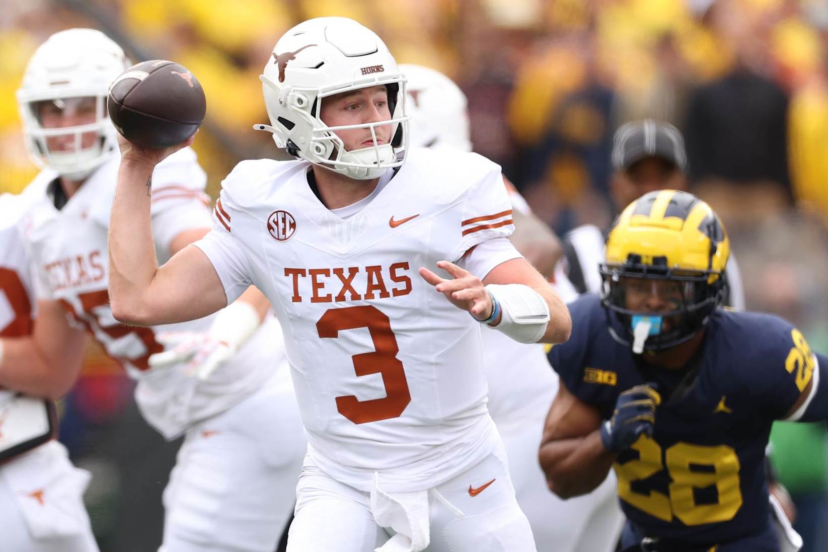 ANN ARBOR, MICHIGAN - SEPTEMBER 07: Quinn Ewers #3 of the Texas Longhorns looks to pass during the first quarter against the Michigan Wolverines at Michigan Stadium on September 07, 2024 in Ann Arbor, Michigan. (Photo by Gregory Shamus/Getty Images)