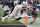 Kansas City Chiefs wide receiver Kadarius Toney (19) scores as Las Vegas Raiders linebacker Luke Masterson and cornerback Sidney Jones IV (31) defend during the first half of a Las Vegas football game NFL on Saturday, January 7, 2023 in Las Vegas. (AP Photo/John Locher)