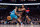 TORONTO, ON - JANUARY 12: Scottie Barnes #4 of the Toronto Raptors makes a pass around Cody Martin #11 of the Charlotte Hornets during the second half at Scotiabank Arena on January 12, 2023 in Toronto, Canada. NOTE TO USER: User expressly acknowledges and agrees that, by downloading and or using this photograph, User is consenting to the terms and conditions of the Getty Images License Agreement. (Photo by Cole Burston/Getty Images)