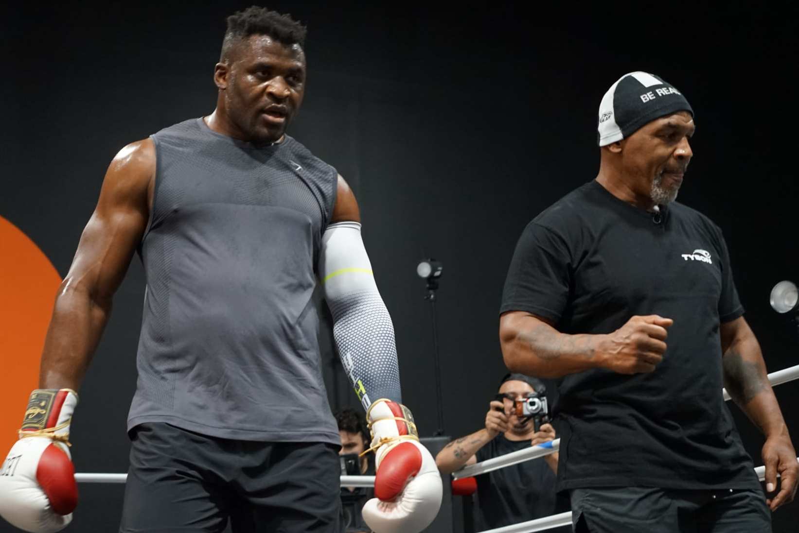 LAS VEGAS, NV - SEPTEMBER 26: Francis Ngannou trains with coach Mike Tyson at the Tyson Fury vs. Francis Ngannou open workout on September 26, 2023, at Ngannou's private gym in Las Vegas, NV. (Photo by Amy Kaplan/Icon Sportswire via Getty Images)