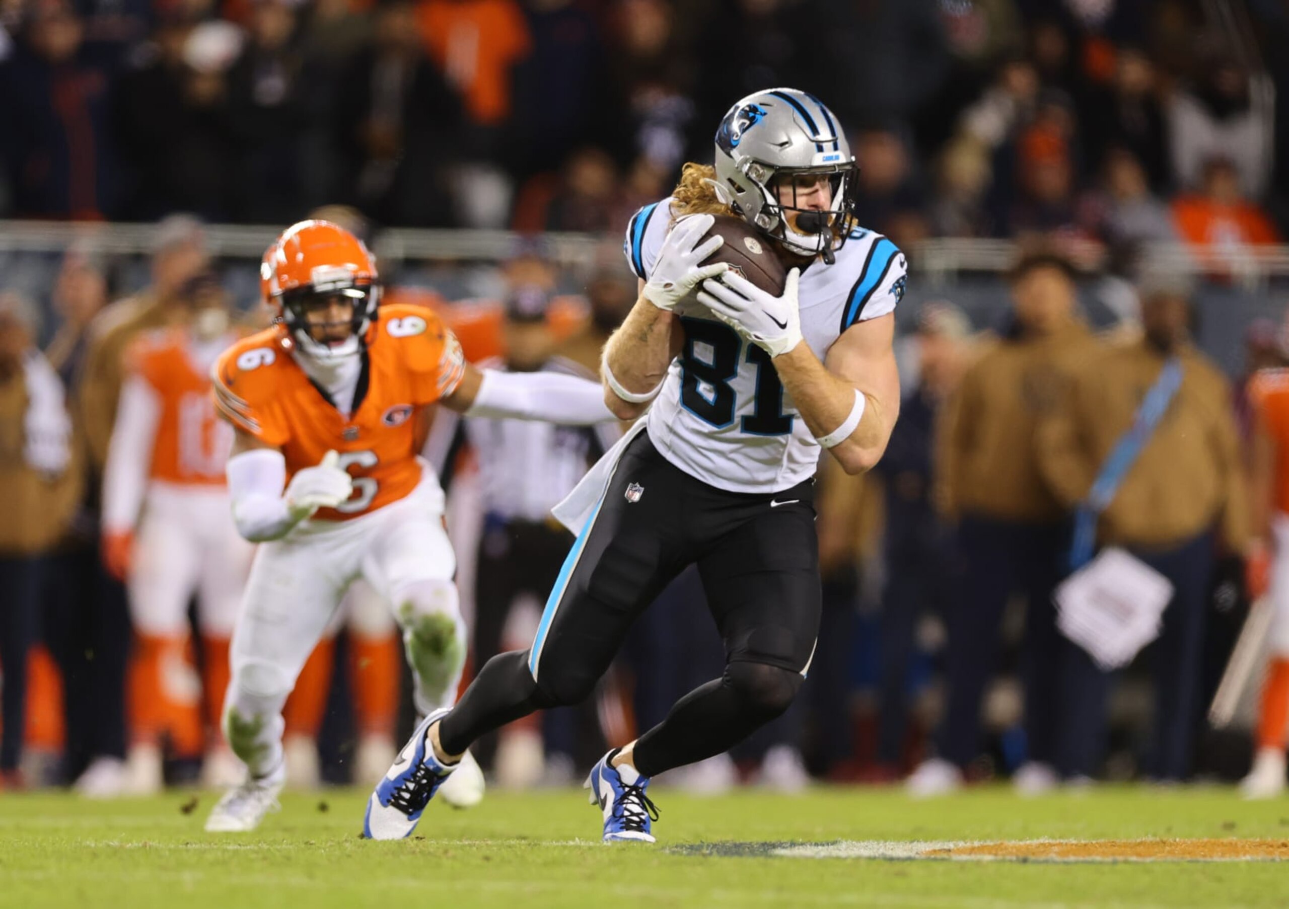 CHICAGO, ILLINOIS - NOVEMBER 09: Hayden Hurst #81 of the Carolina Panthers runs after catching a pass during the fourth quarter against the Chicago Bears at Soldier Field on November 09, 2023 in Chicago, Illinois. (Photo by Michael Reaves/Getty Images) CHICAGO, ILLINOIS - NOVEMBER 09: Hayden Hurst #81 of the Carolina Panthers runs after catching a pass during the fourth quarter against the Chicago Bears at Soldier Field on November 09, 2023 in Chicago, Illinois. (Photo by Michael Reaves/Getty Images)