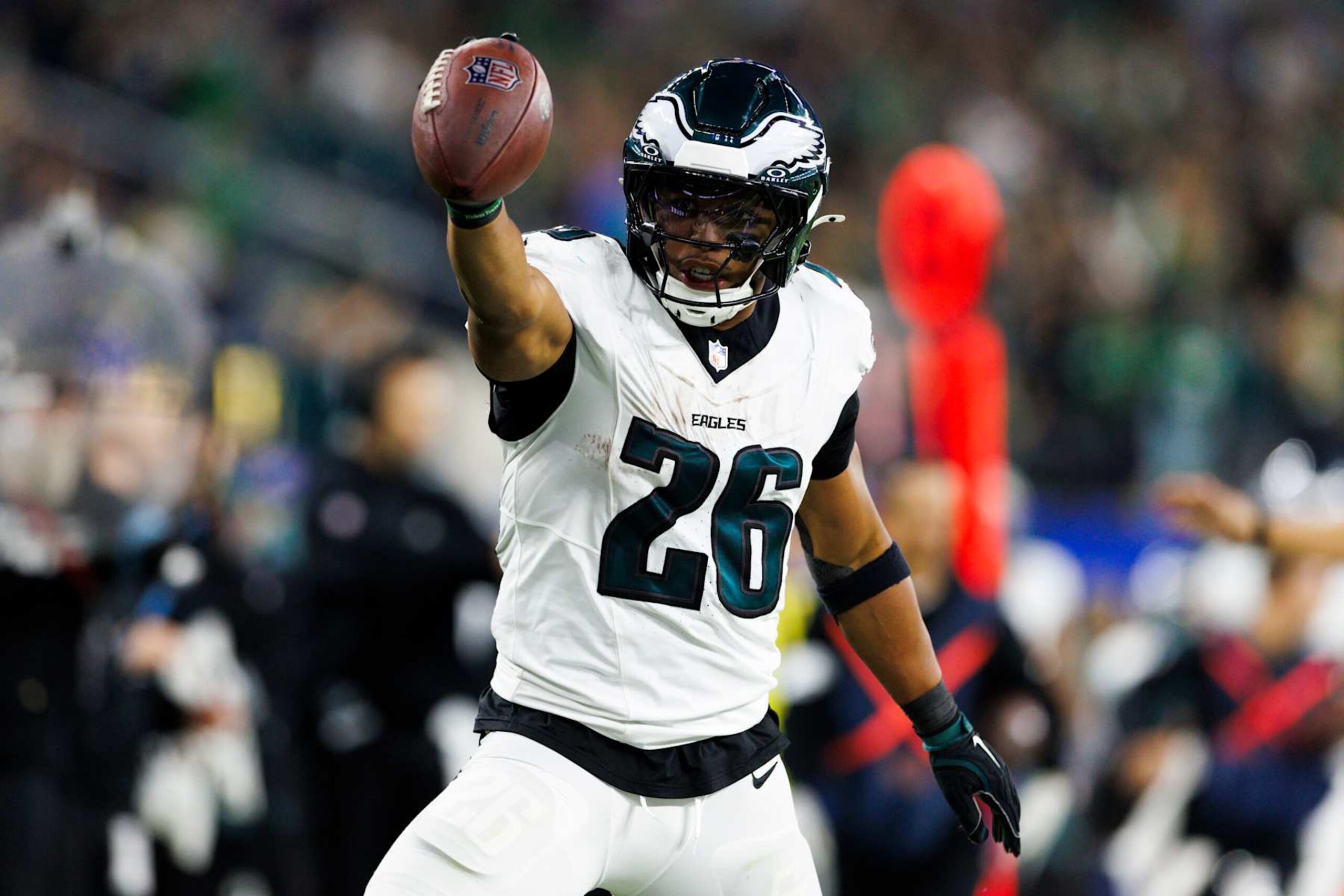INGLEWOOD, CALIFORNIA - NOVEMBER 24: Saquon Barkley #26 of the Philadelphia Eagles celebrates during the second half against the Los Angeles Rams at SoFi Stadium on November 24, 2024 in Inglewood, California. (Photo by Ric Tapia/Getty Images)